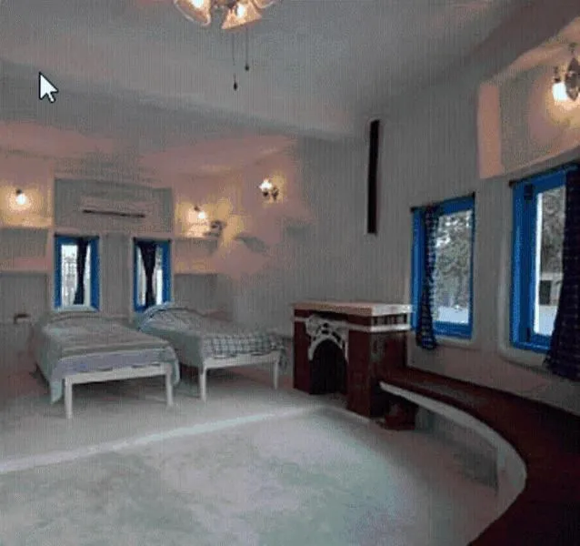 Bed in Scenic Riverside Resort