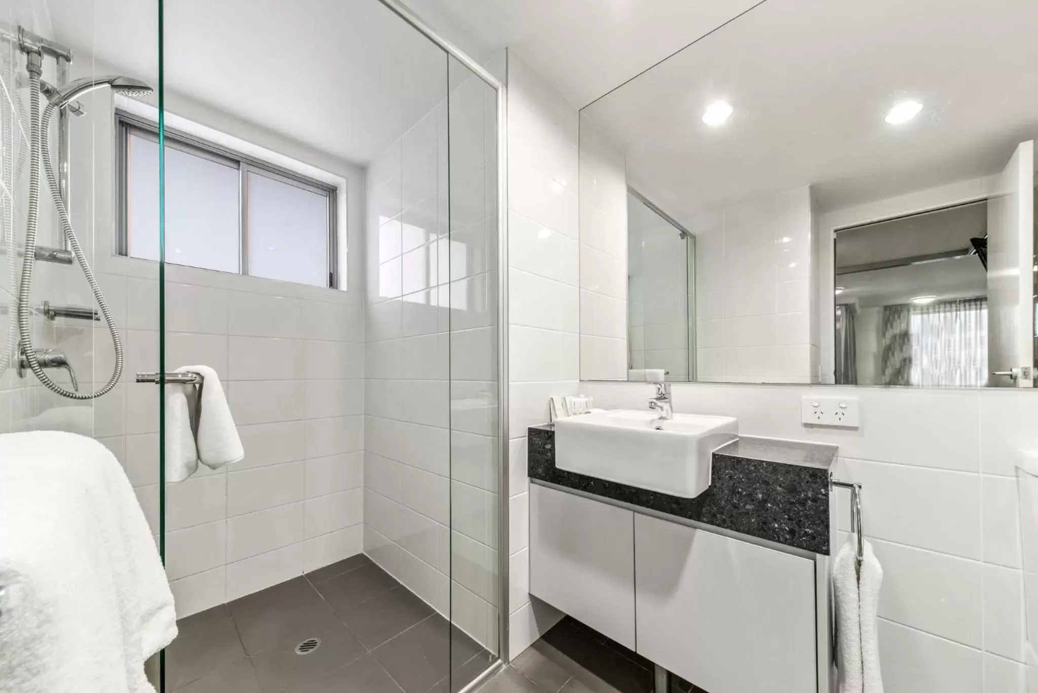 Shower, Bathroom in The Capitol Apartments