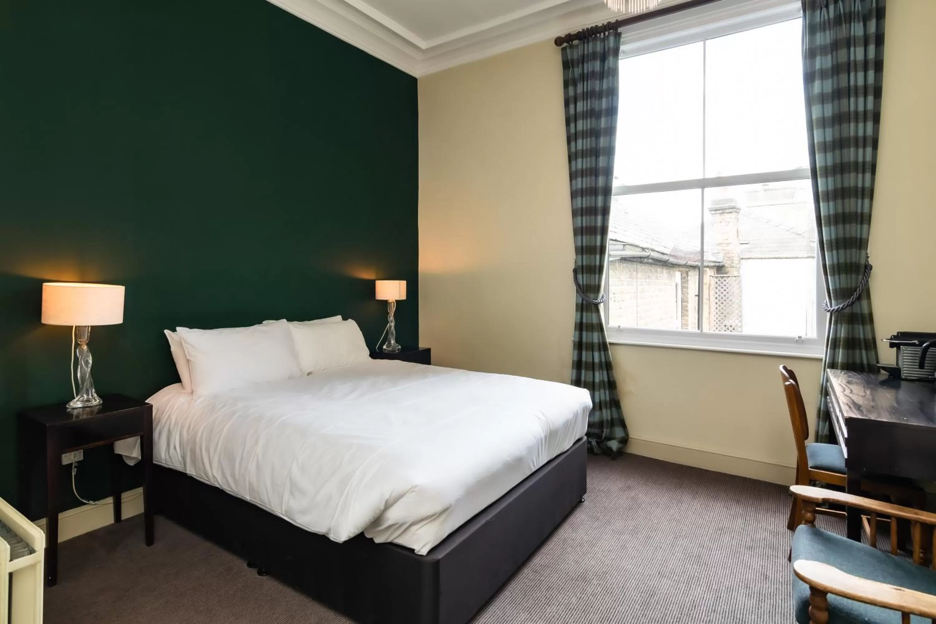 Bed in Kew Gardens Hotel