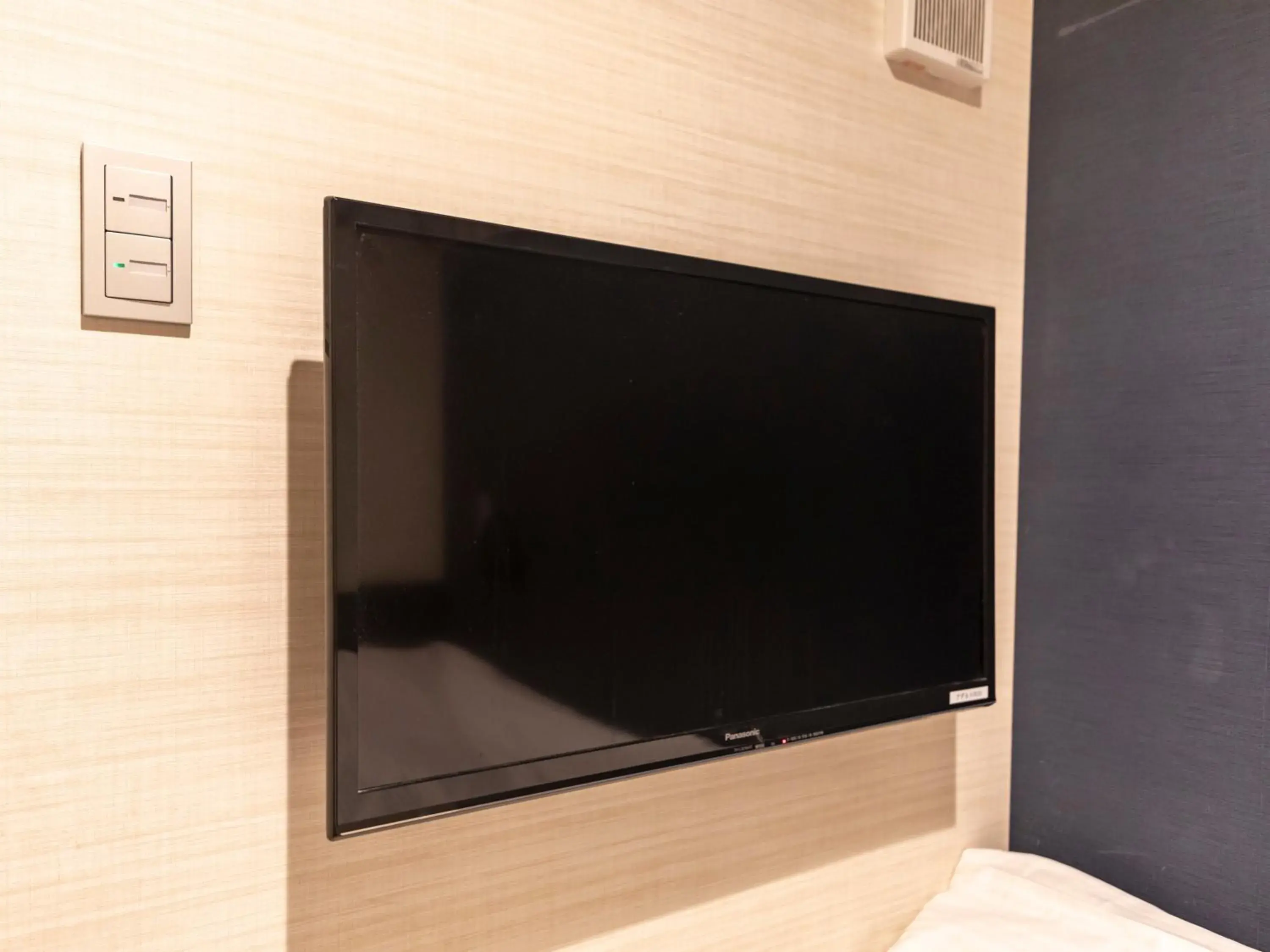 Photo of the whole room, TV/Entertainment Center in Tabist Hotel Smart Sleeps Oita Station