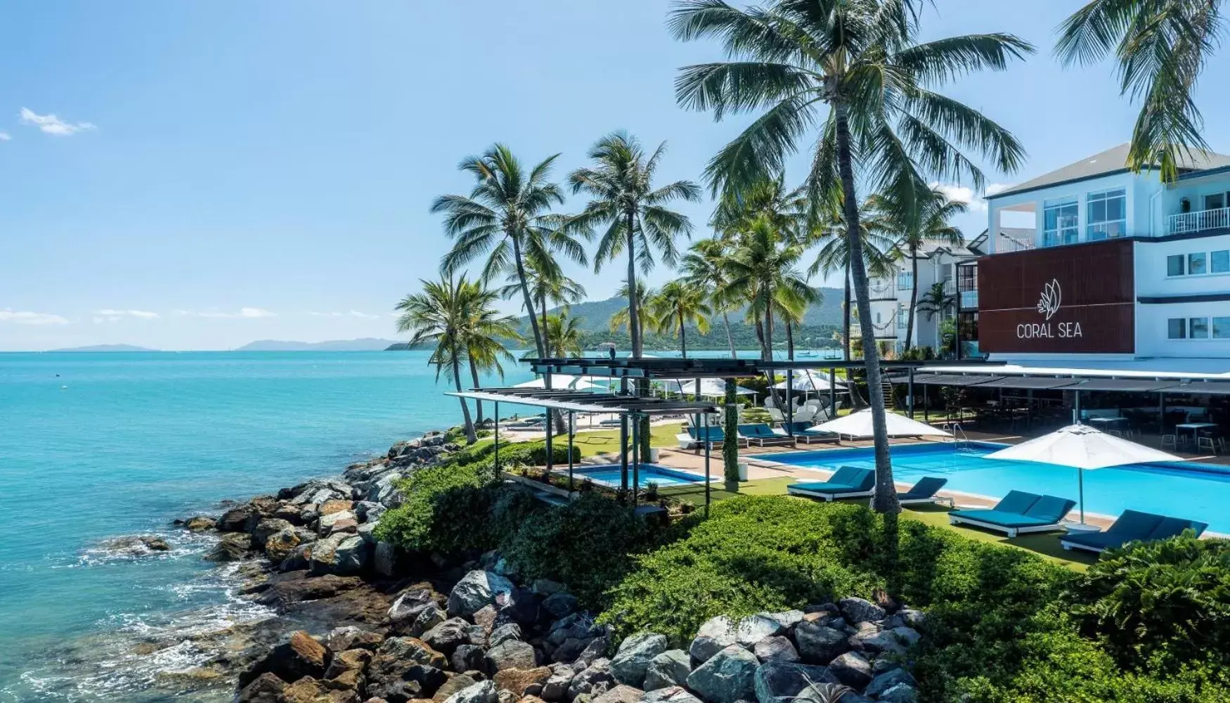 Property building, Swimming Pool in Coral Sea Marina Resort