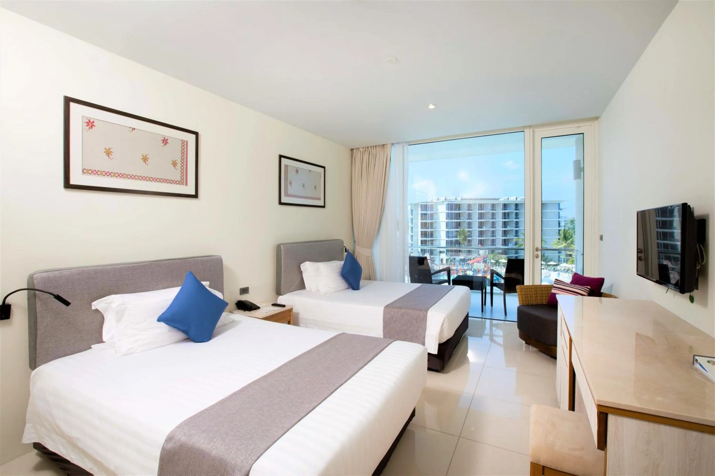 Photo of the whole room, Bed in Splash Beach Resort Phuket Family-Friendly Water Park Resort Near Phuket Airport