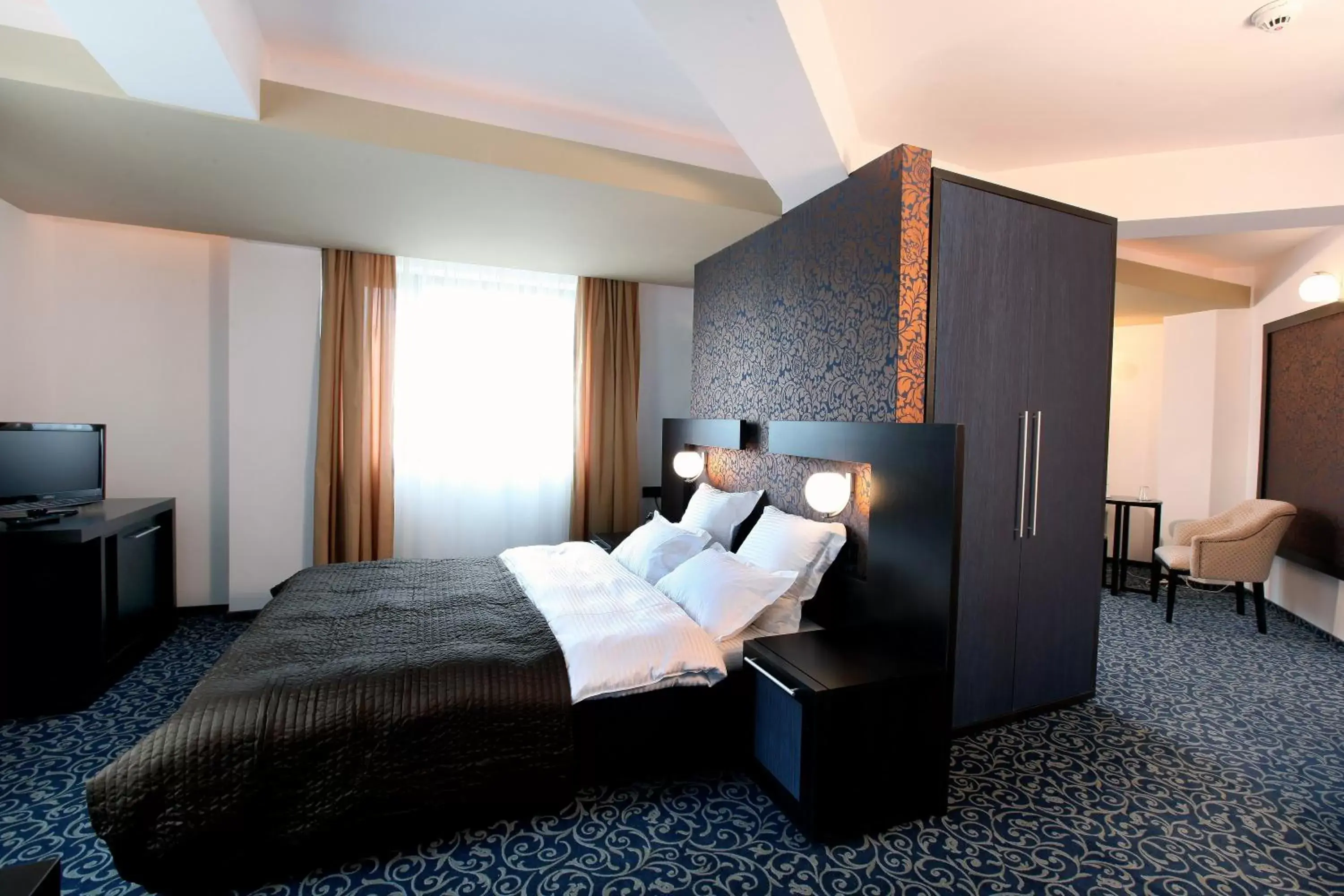 Bed in Ambiance Hotel