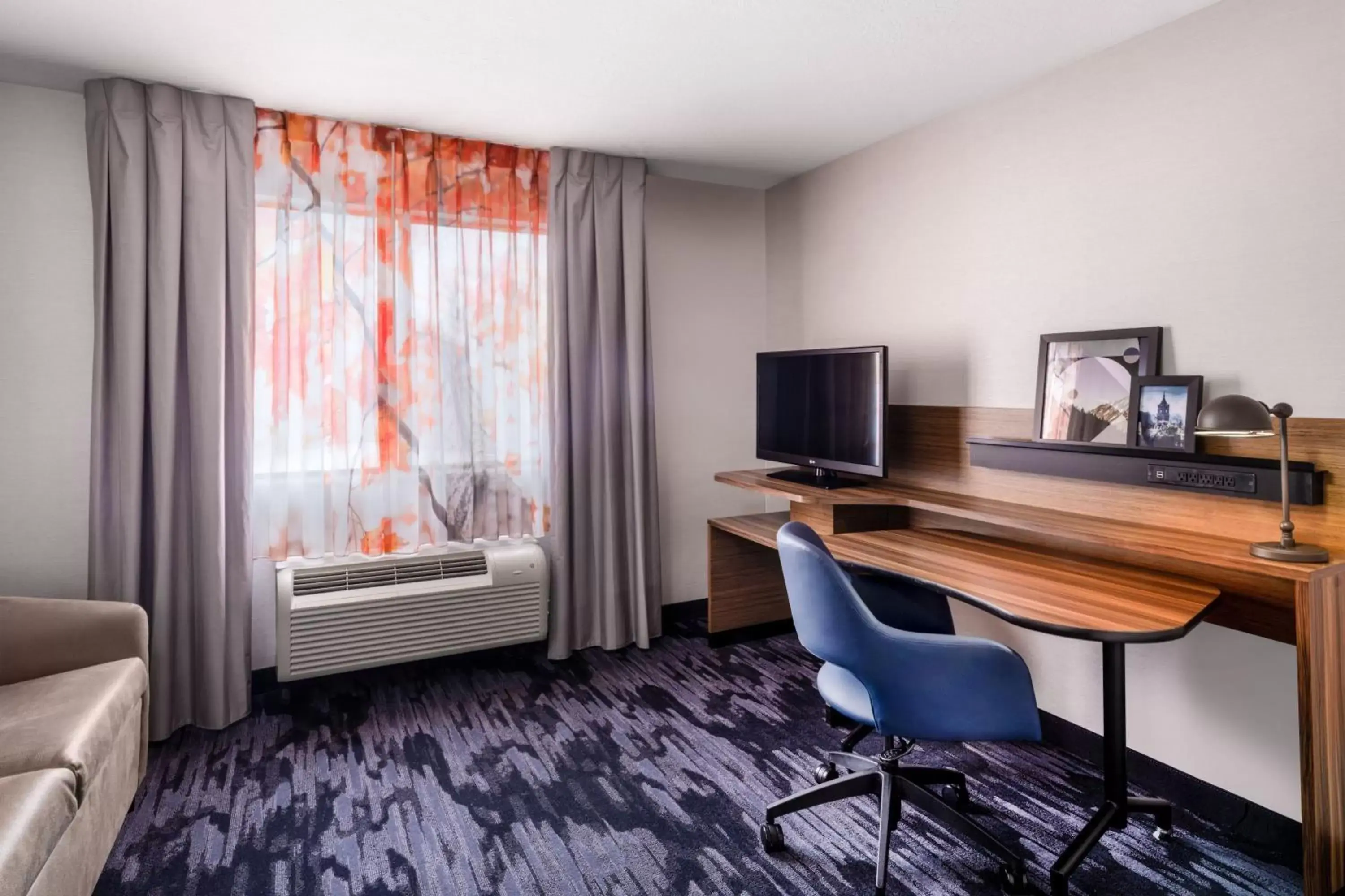 Photo of the whole room, TV/Entertainment Center in Fairfield Inn & Suites by Marriott Salt Lake City Downtown