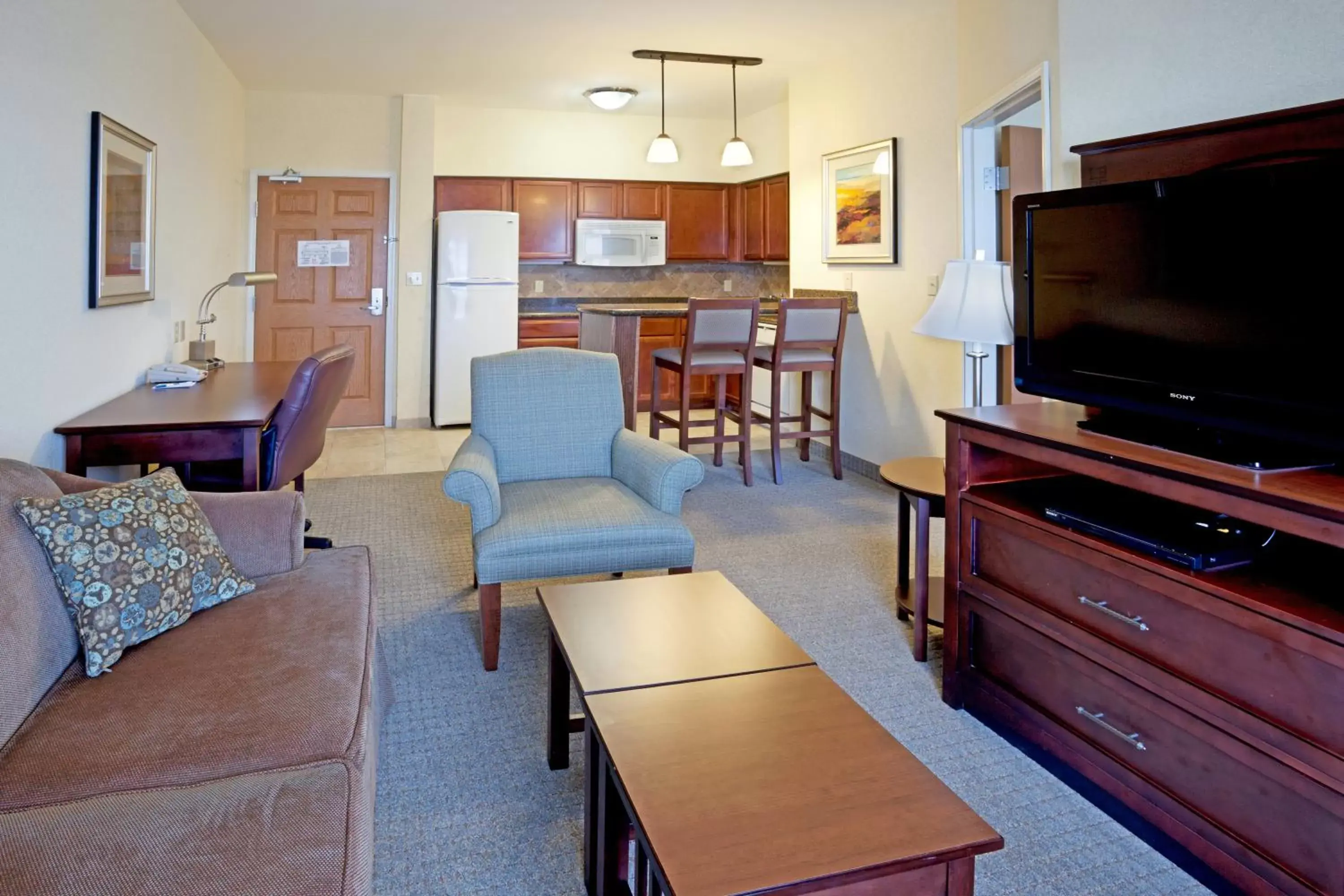Bedroom, TV/Entertainment Center in Staybridge Suites Corpus Christi, an IHG Hotel