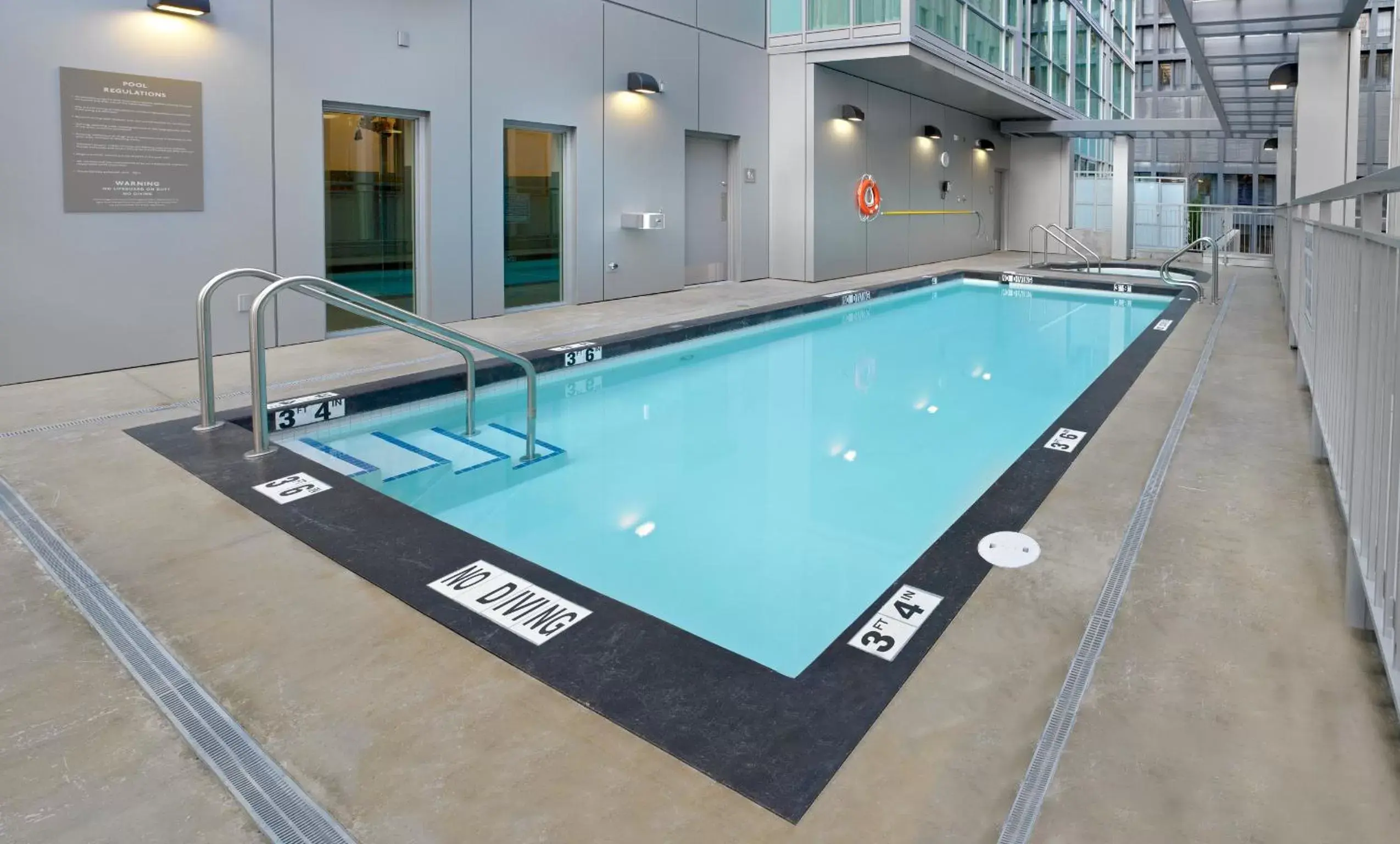 Swimming Pool in Coast Coal Harbour Vancouver Hotel by APA