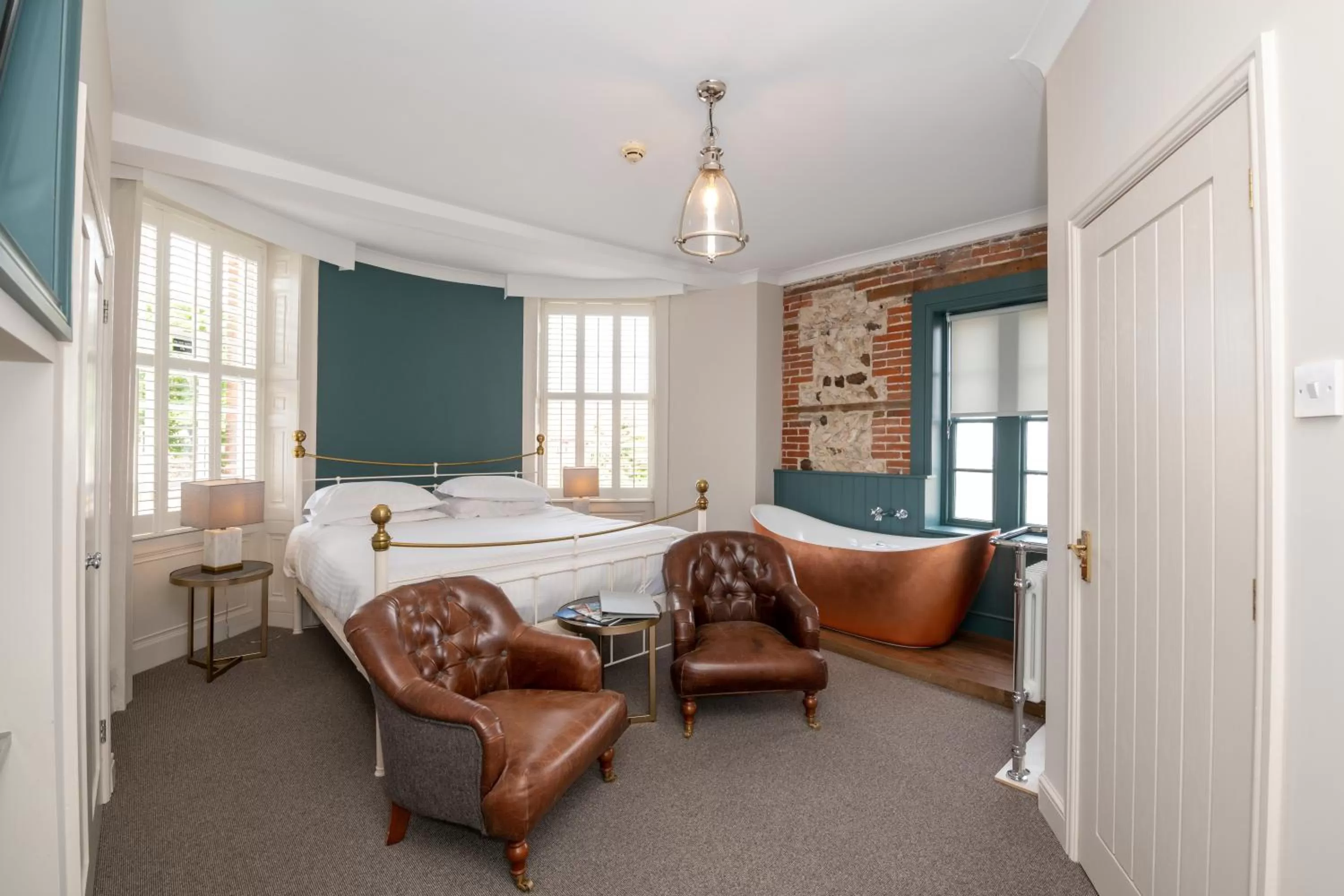 Bed, Seating Area in The Lodge