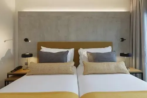 Bed in NEYA Porto Hotel