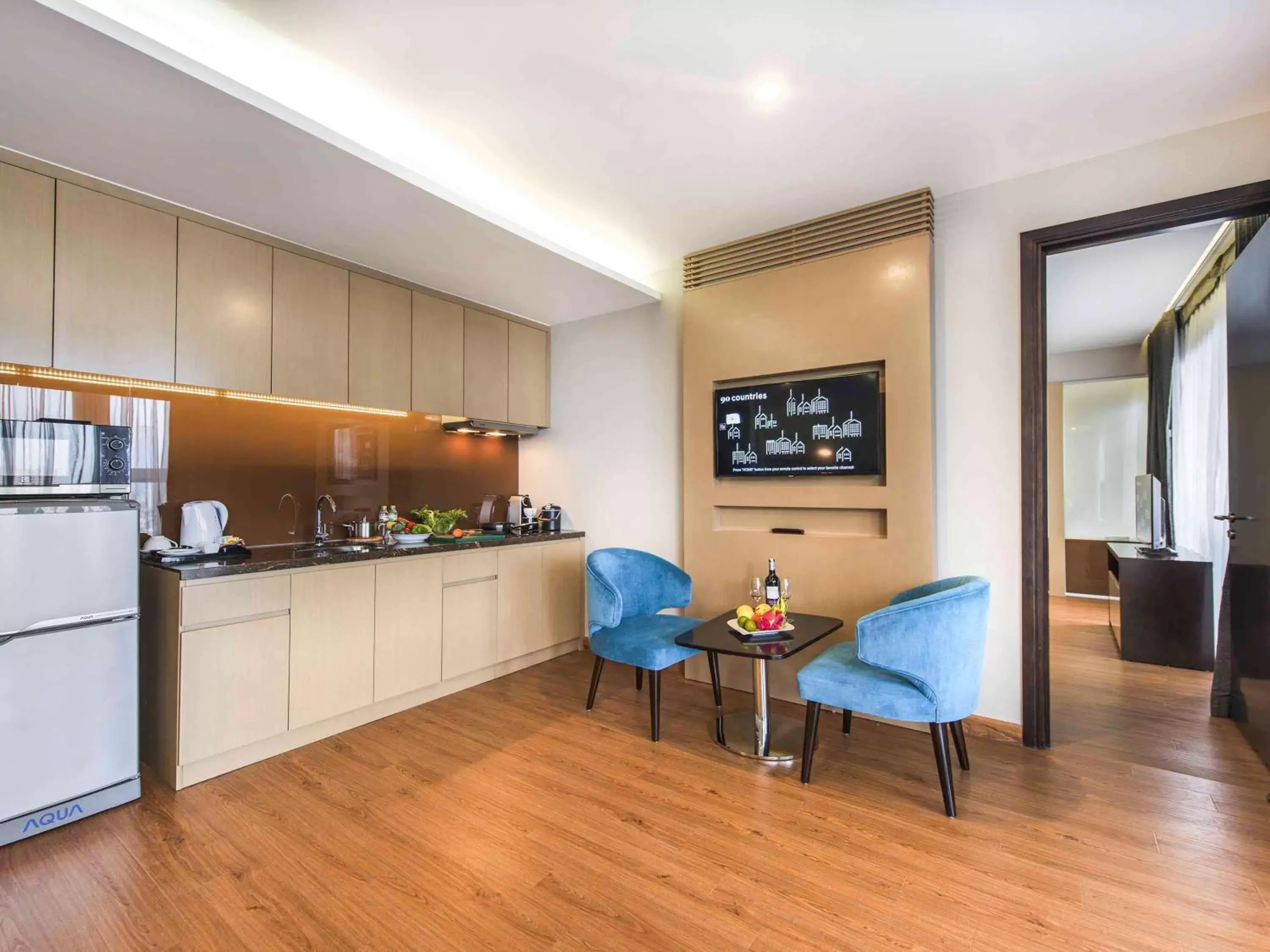 Photo of the whole room, Kitchen/Kitchenette in Novotel Suites Hanoi