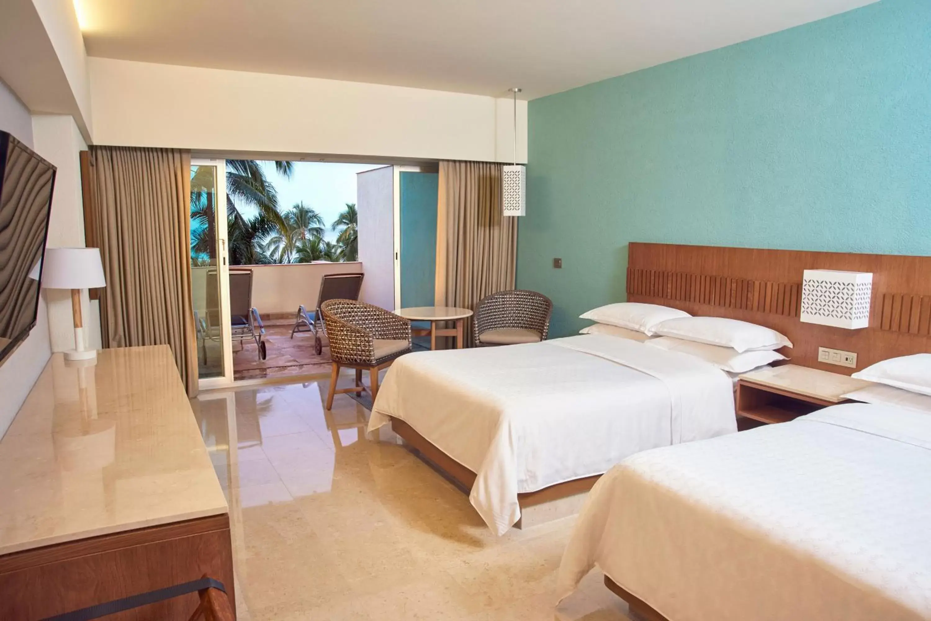 Photo of the whole room, Bed in Sheraton Buganvilias Resort & Convention Center