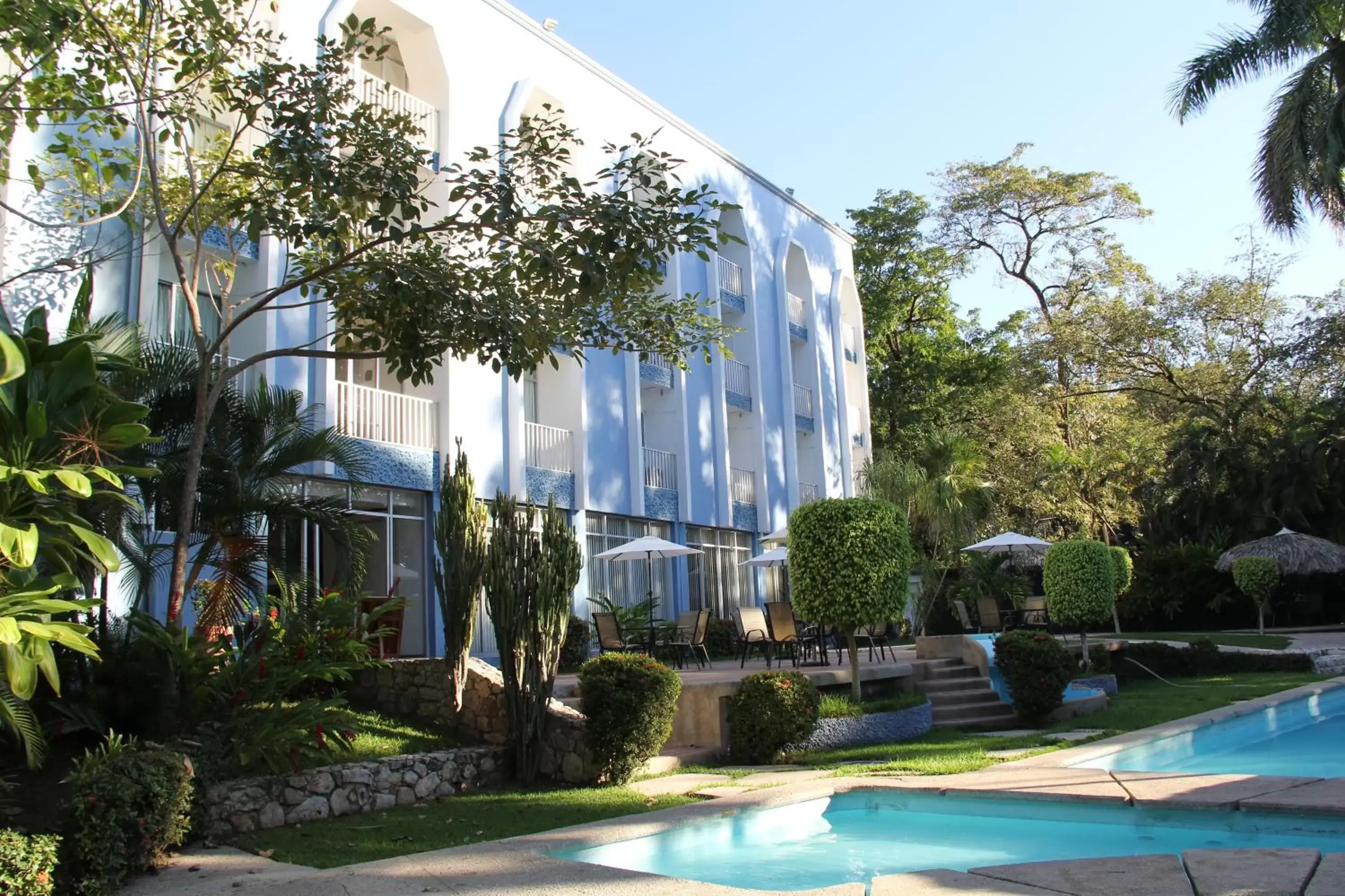 Property building, Swimming Pool in Hotel Maya Palenque