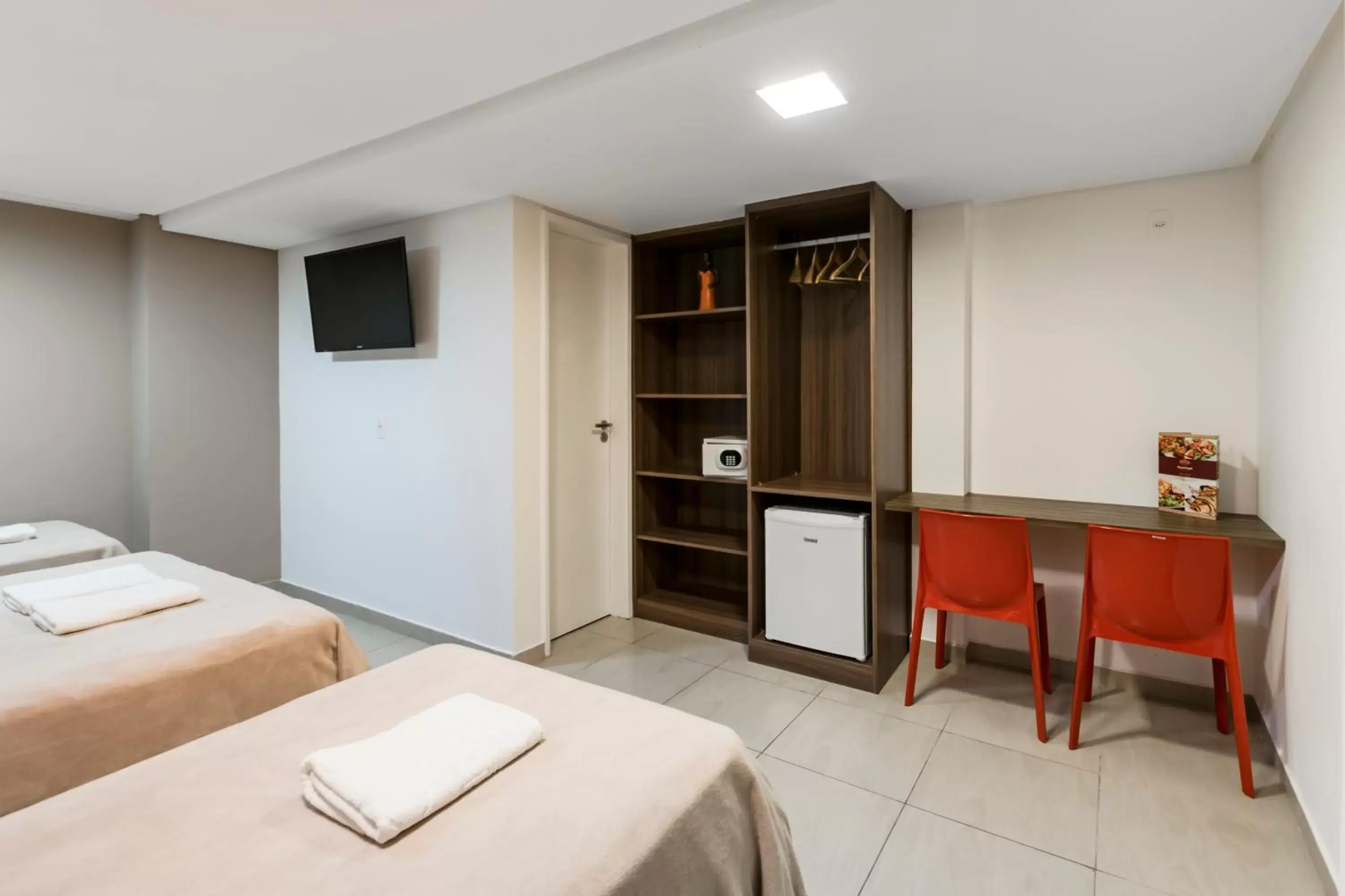 Photo of the whole room, TV/Entertainment Center in NovoHotell Recife