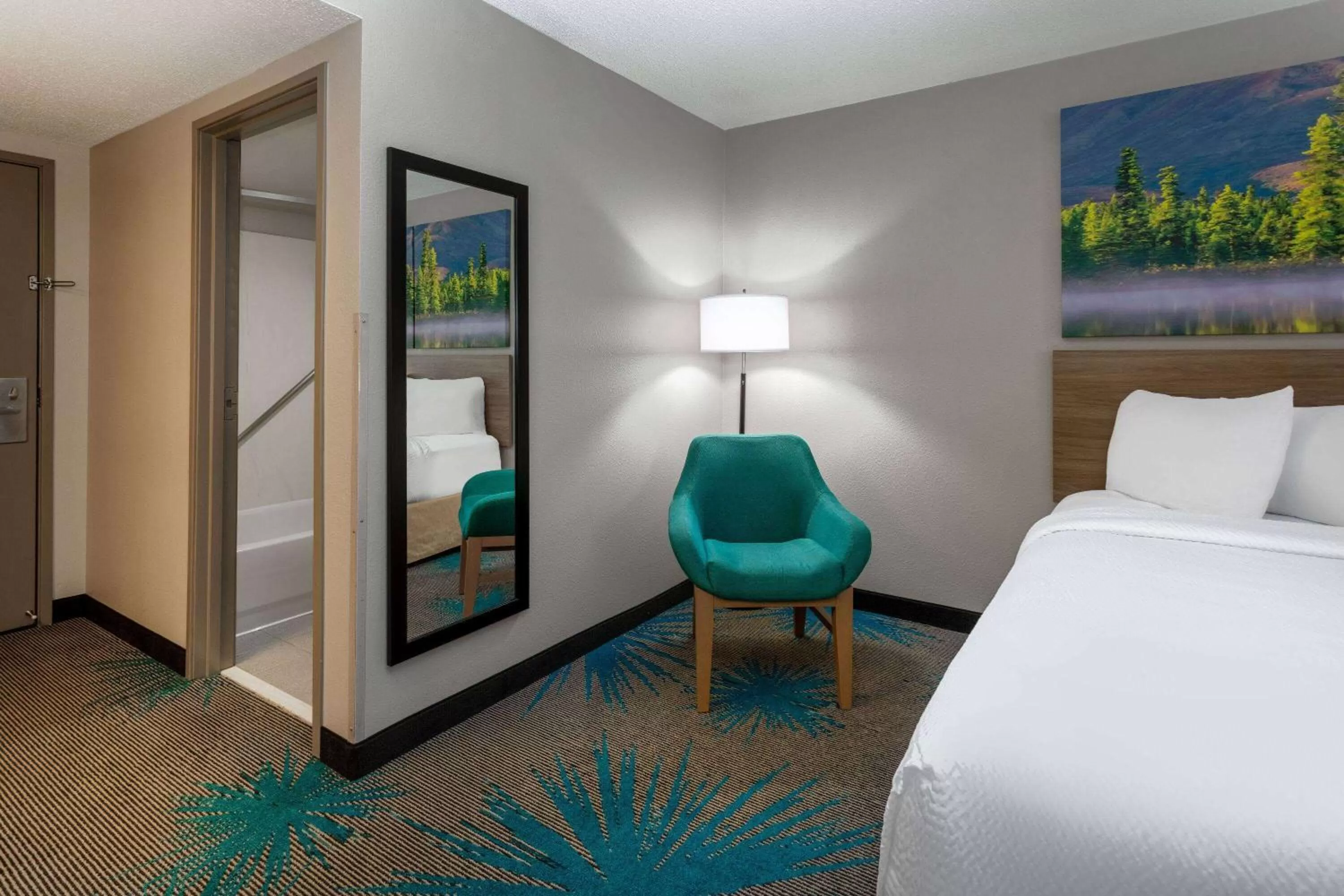 Photo of the whole room, Bed in Days Inn & Suites by Wyndham Denver International Airport