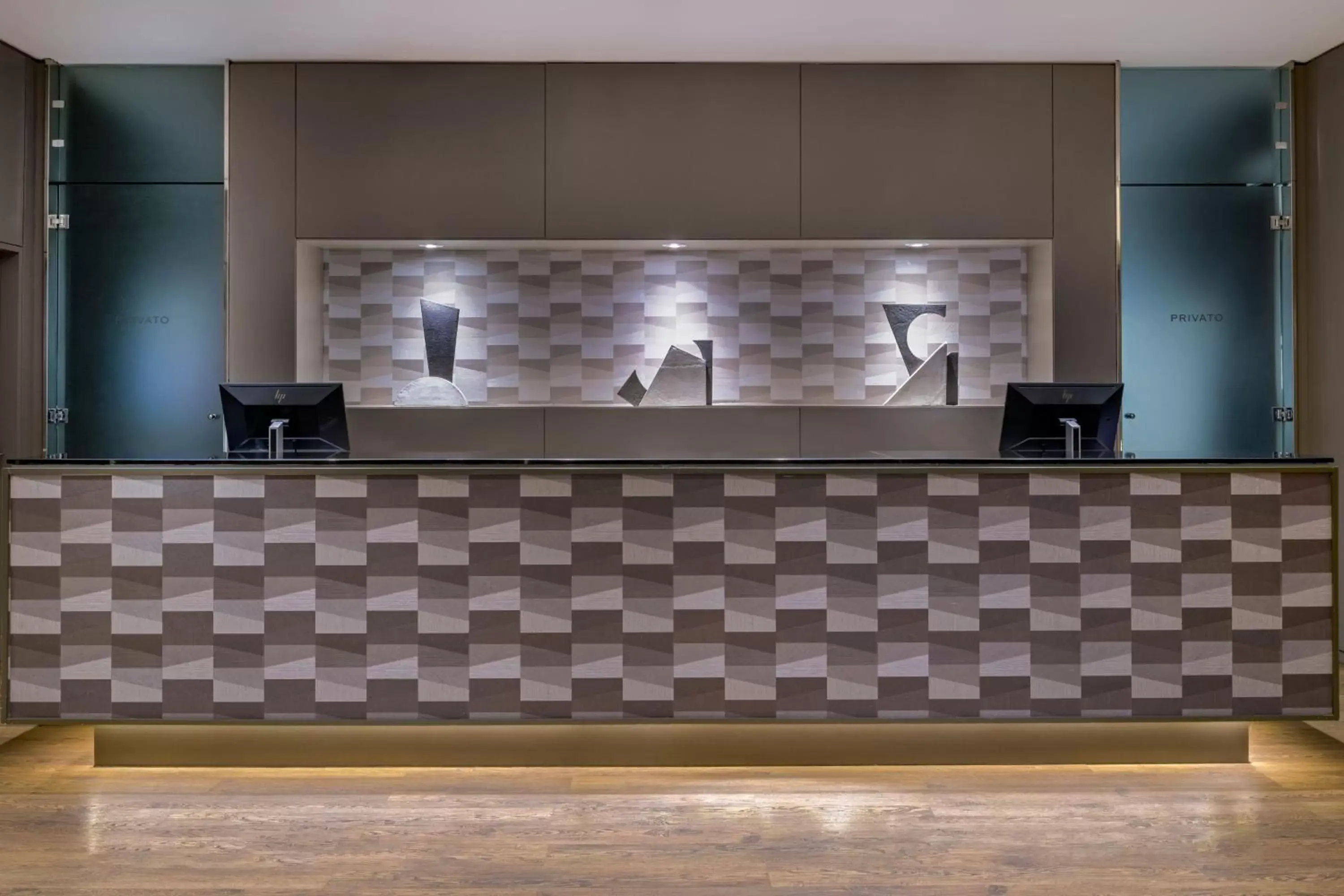 Lobby or reception, Kitchen/Kitchenette in AC Hotel by Marriott Pisa