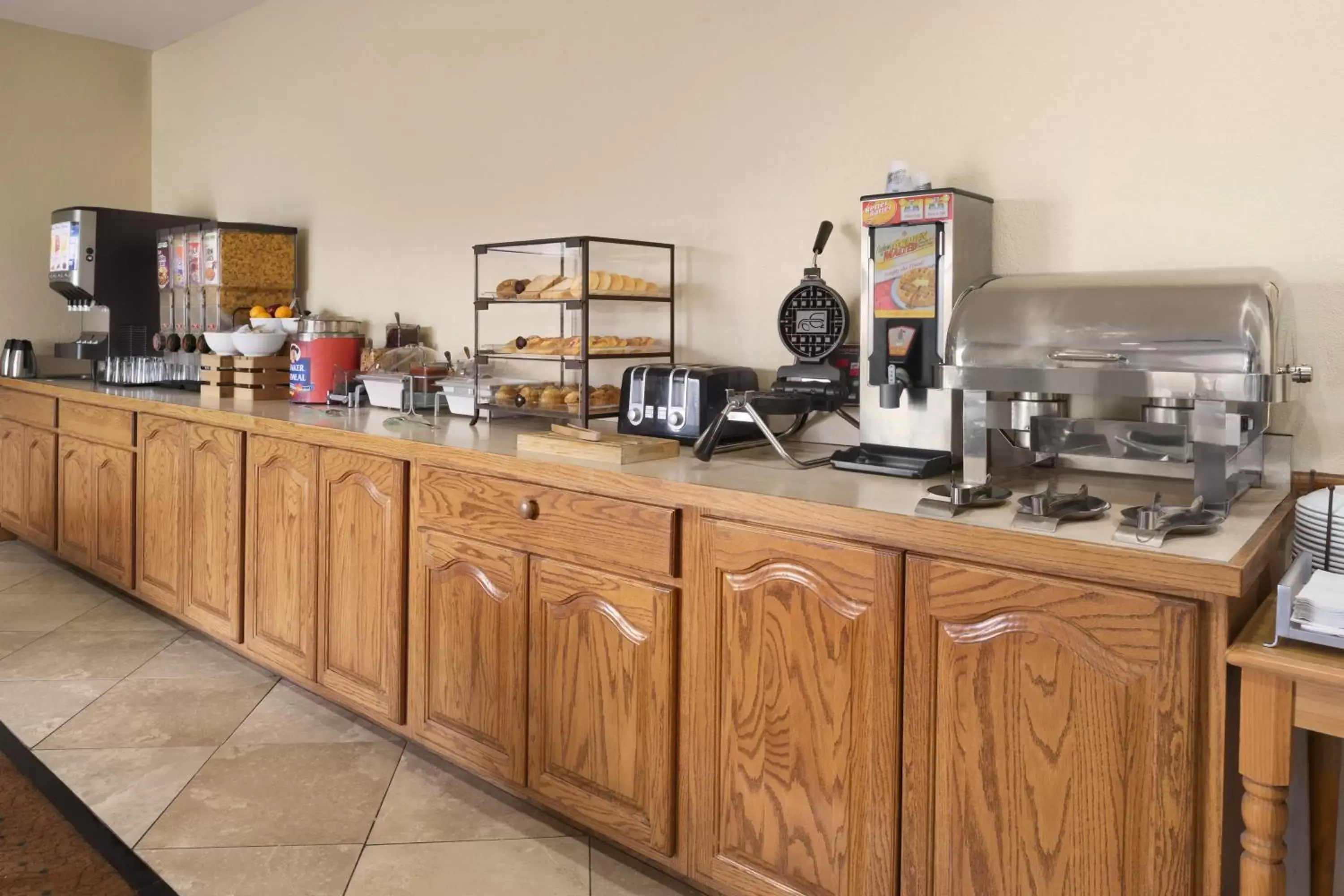 Buffet breakfast in Country Inn & Suites by Radisson, Topeka West, KS