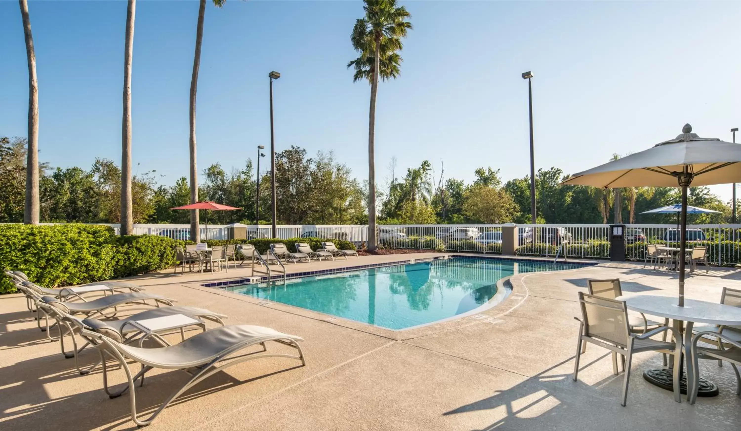 Swimming Pool in Holiday Inn Express & Suites Orlando International Airport, an IHG Hotel