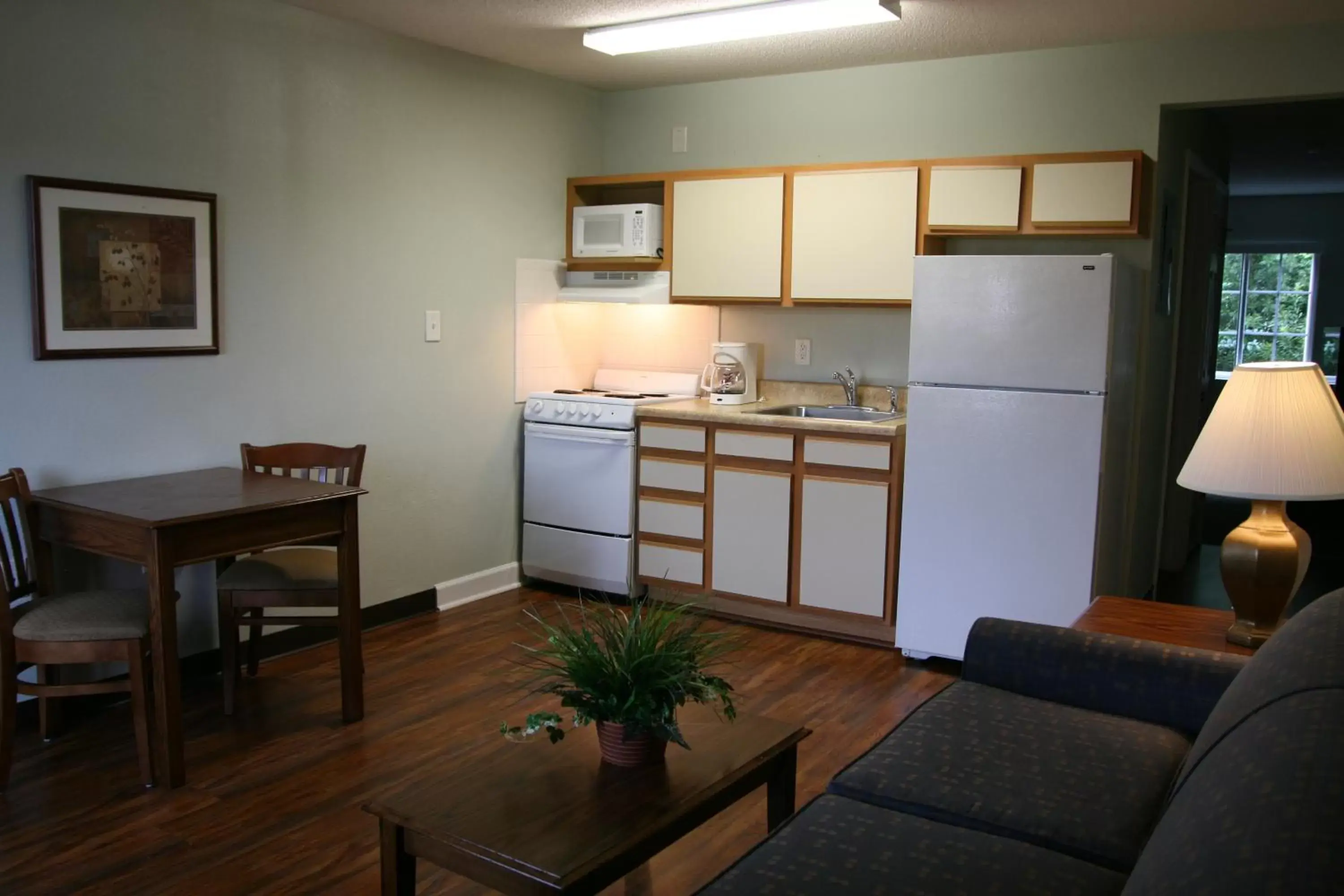 Kitchen or kitchenette, Kitchen/Kitchenette in Affordable Suites Jacksonville