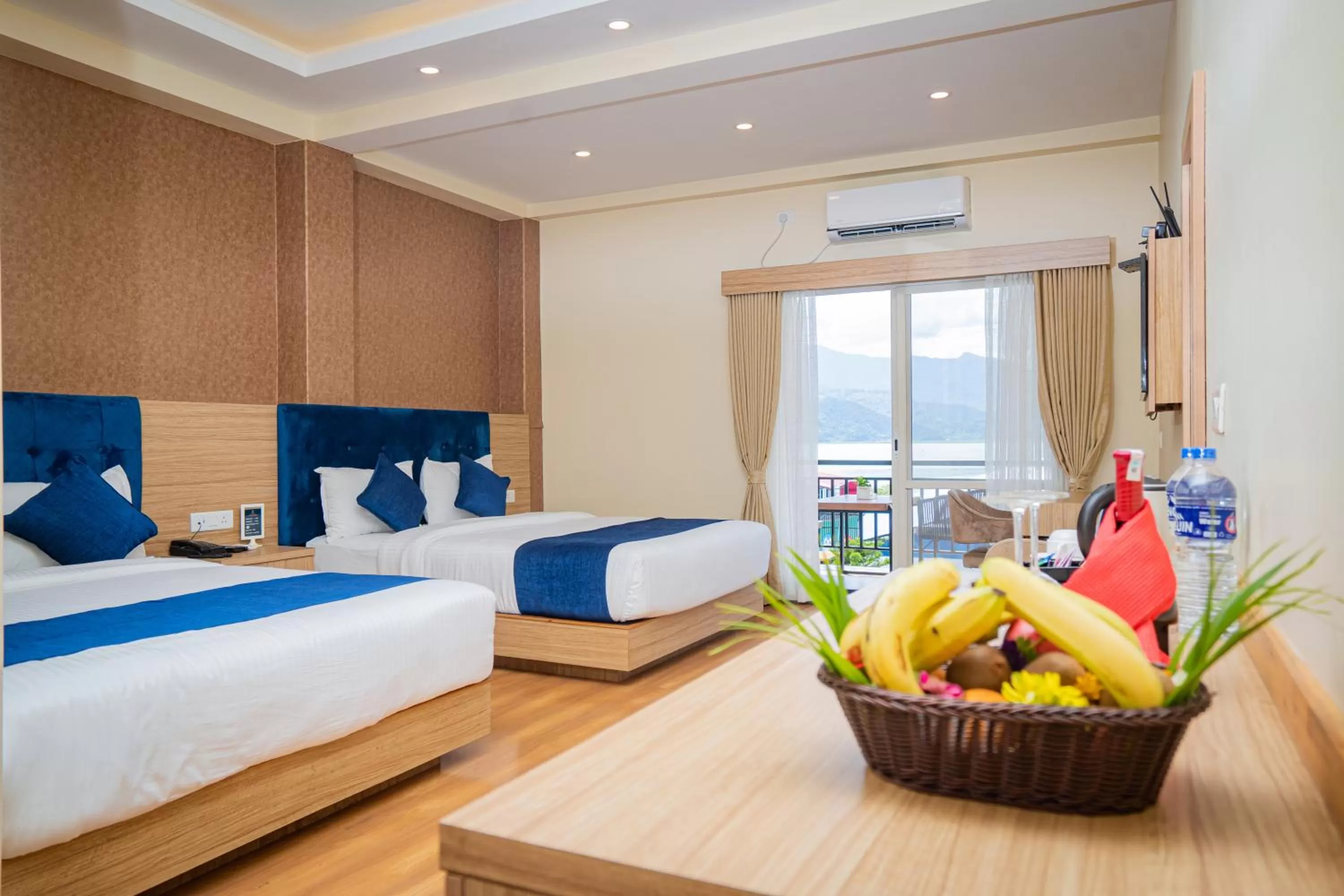 Bed in Majestic Lake Front Hotel & Suites