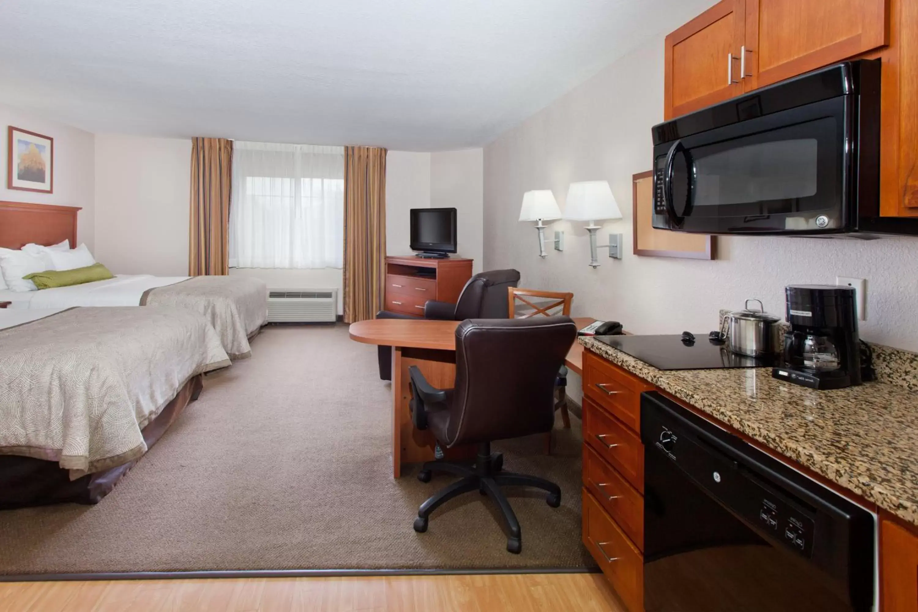 Photo of the whole room, TV/Entertainment Center in Candlewood Suites Lexington, an IHG Hotel