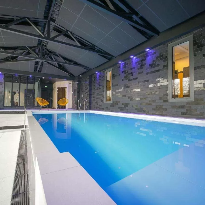 Swimming pool in Le Magic Hôtel & Spa