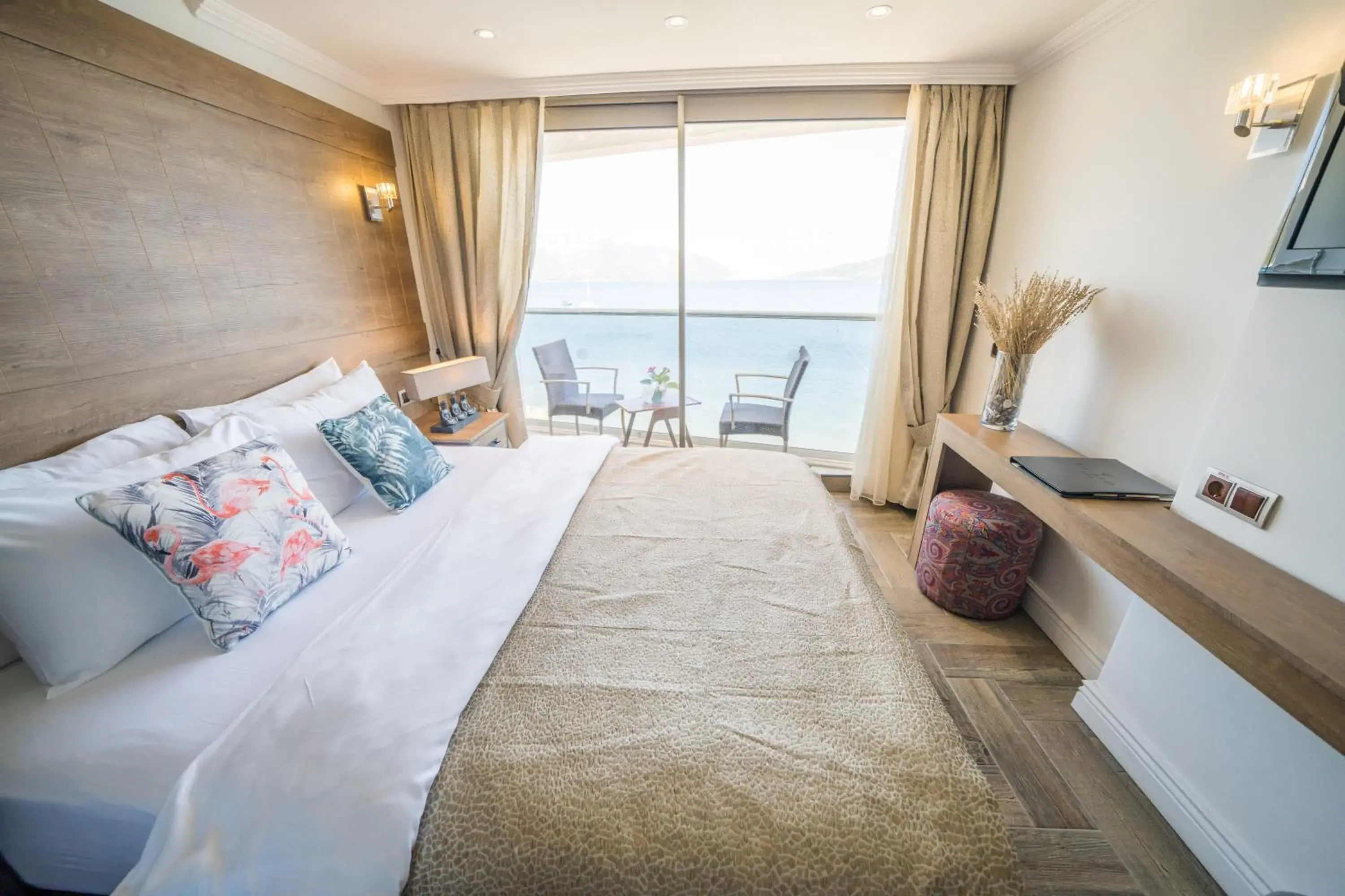 Bed in Aurasia Beach Hotel