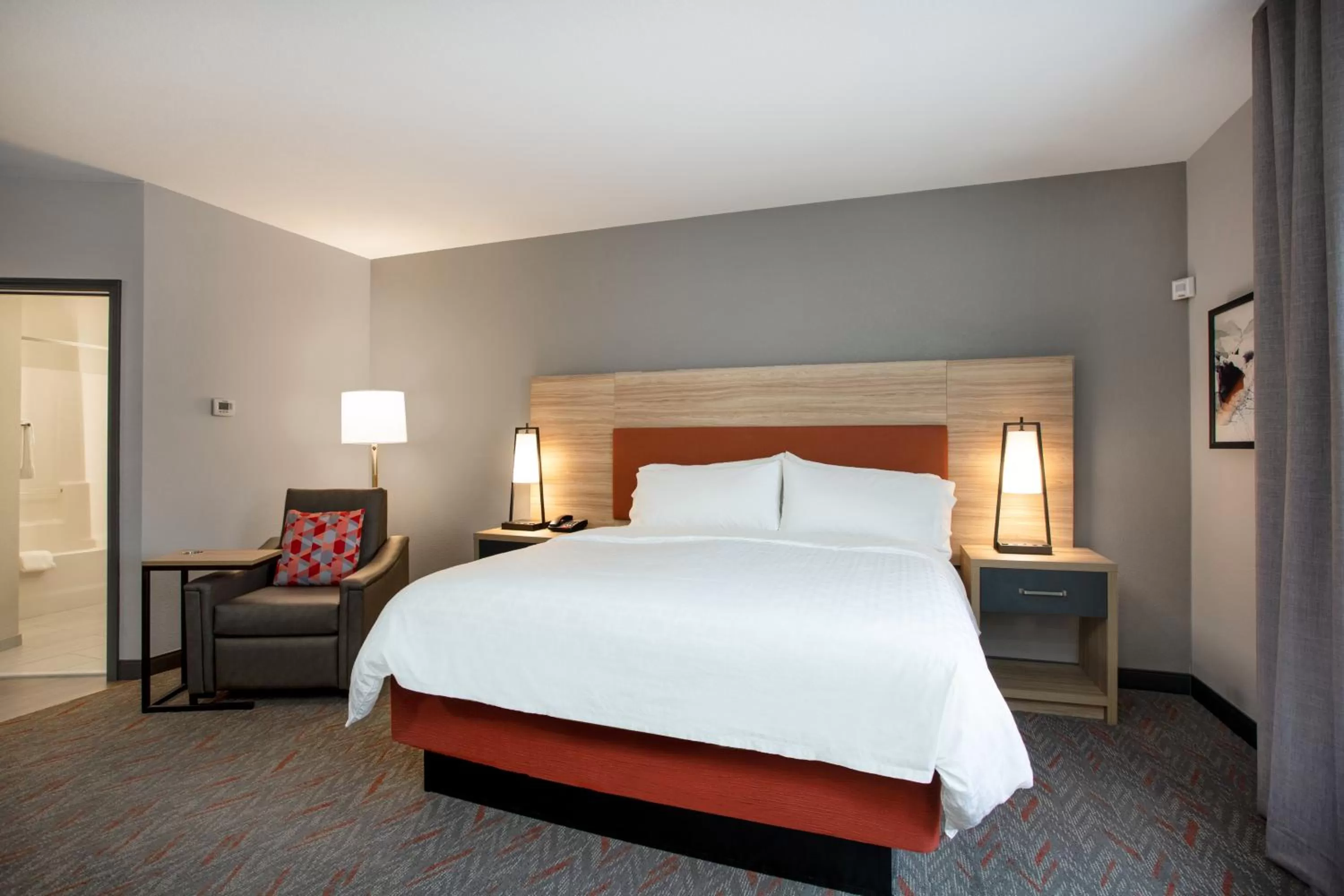 Photo of the whole room, Bed in Candlewood Suites Apex Raleigh Area by IHG