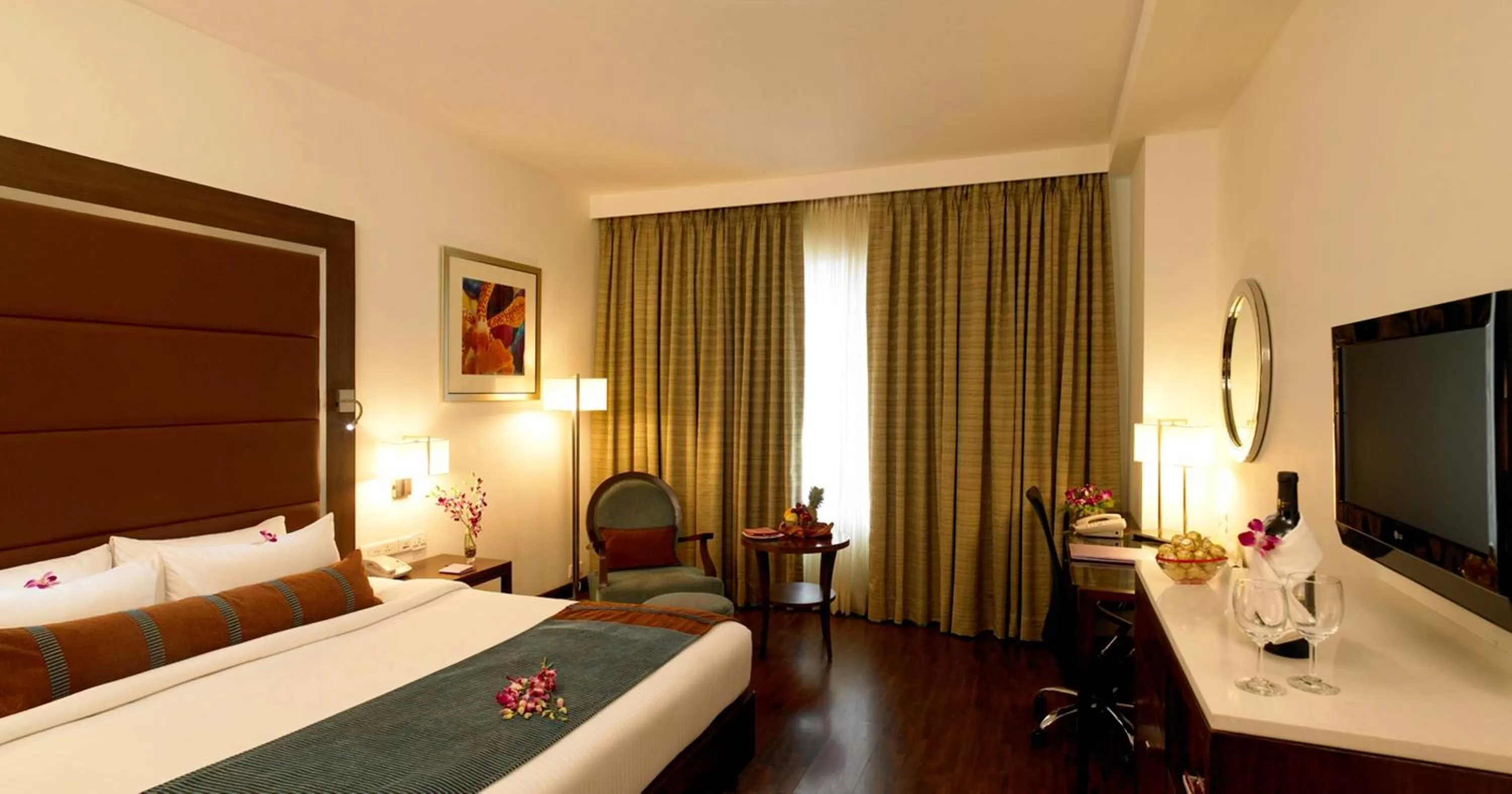 Photo of the whole room, Bed in Royal Orchid Central, Pune