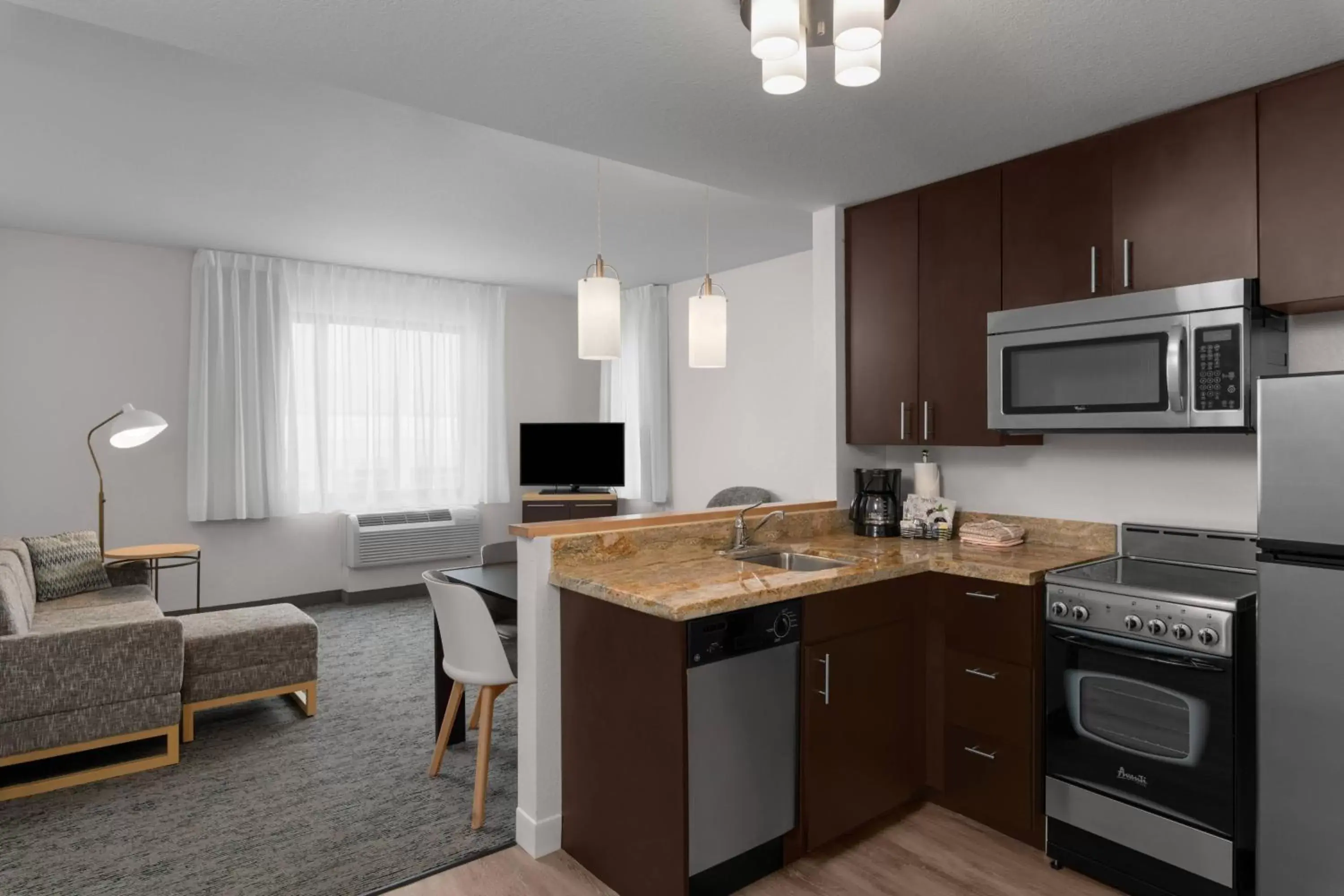 Bedroom, Kitchen/Kitchenette in TownPlaces Suite Denver Airport at Gateway Park