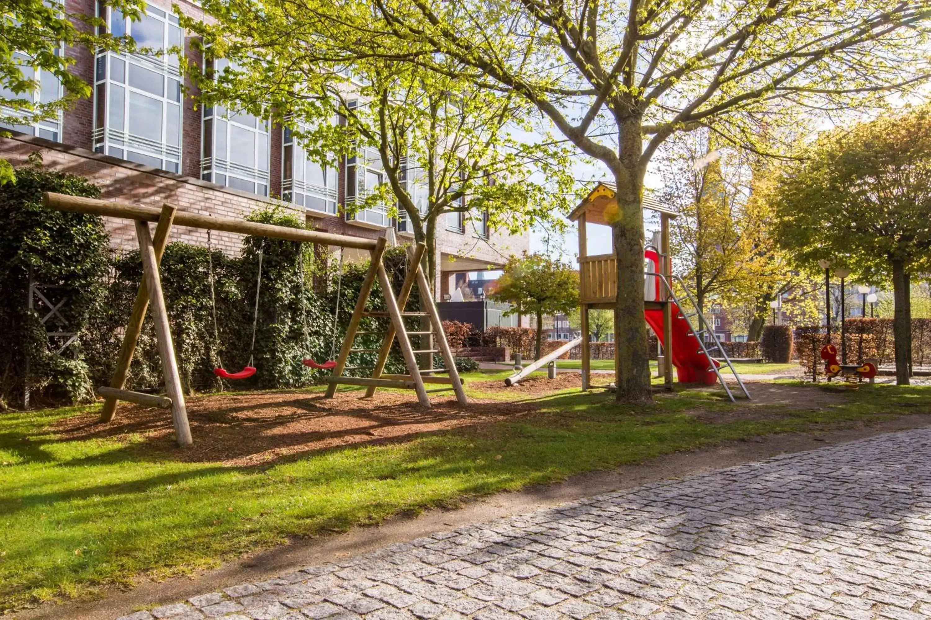 Garden, Children's Play Area in Radisson Blu Senator Hotel, Lübeck