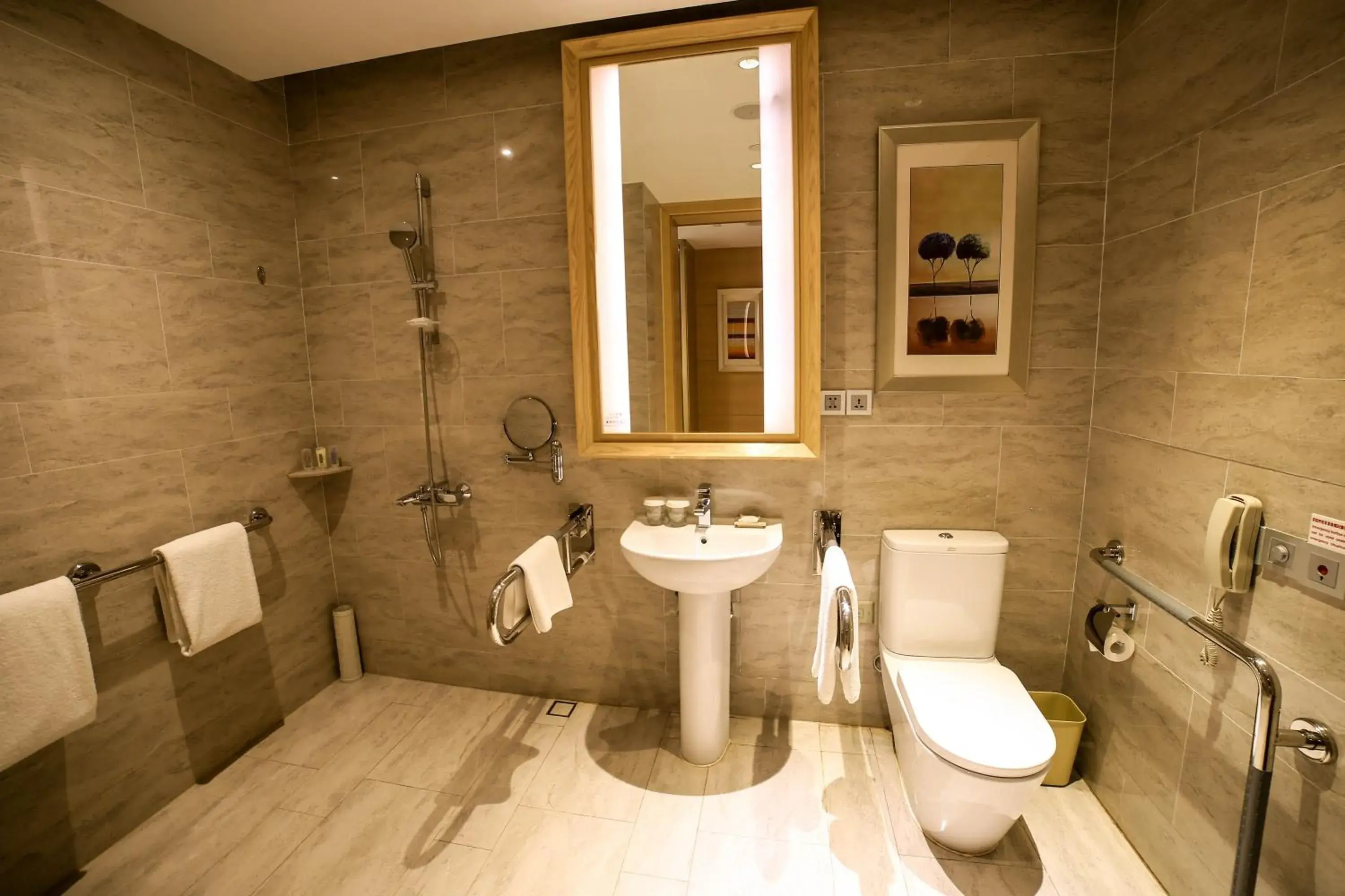 Toilet, Bathroom in Holiday Inn Qingdao Expo, an IHG Hotel