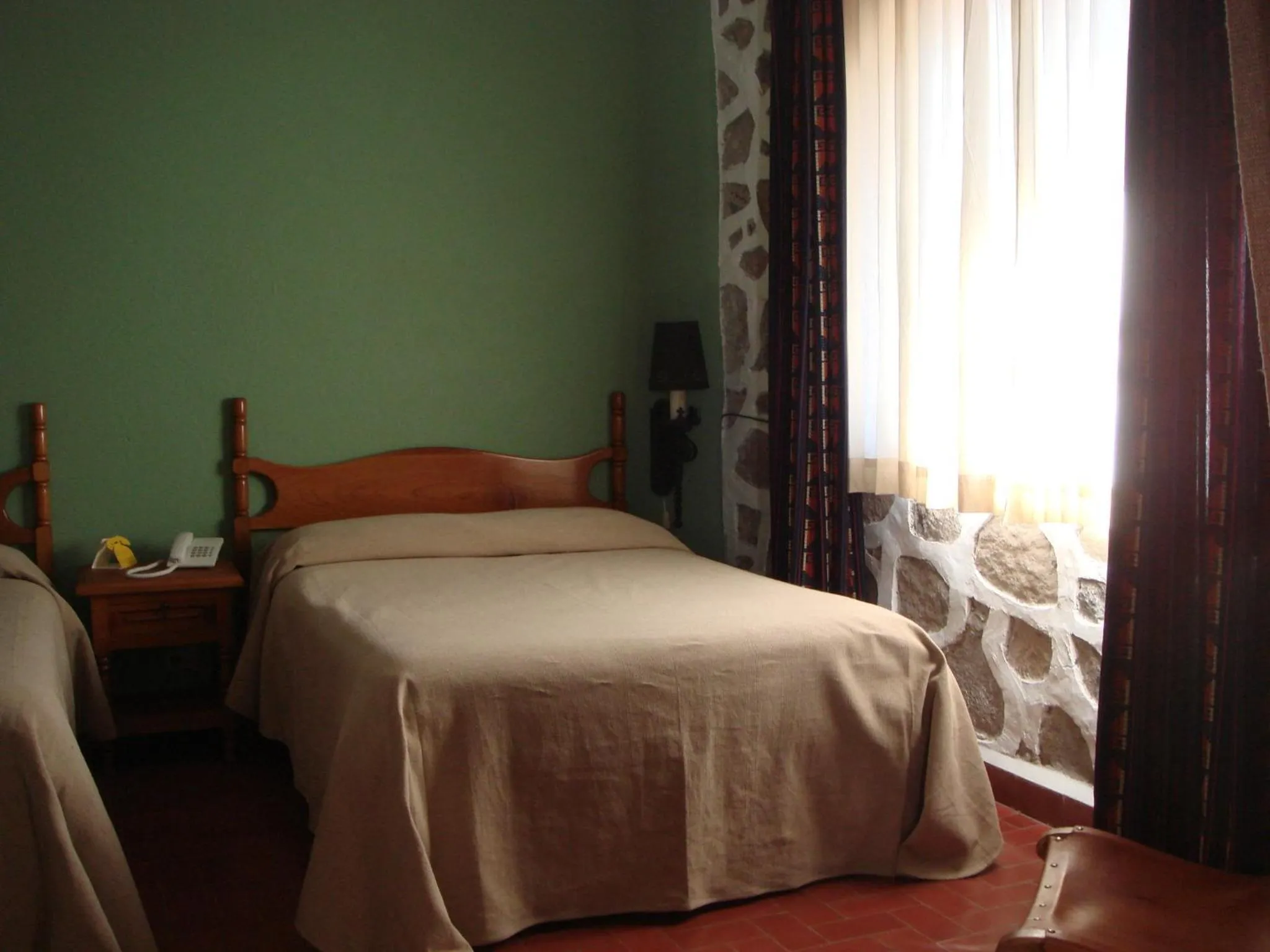 Bed in Rancho Hotel Atascadero