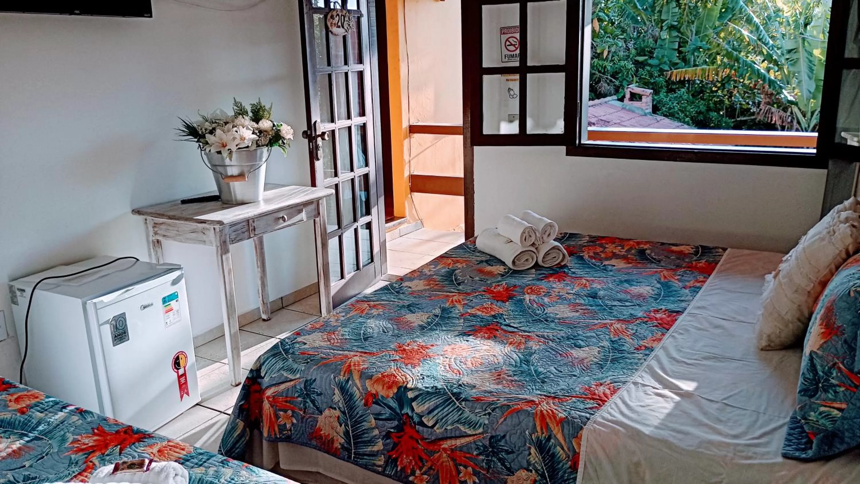 Bed in Hibiscos Pousada