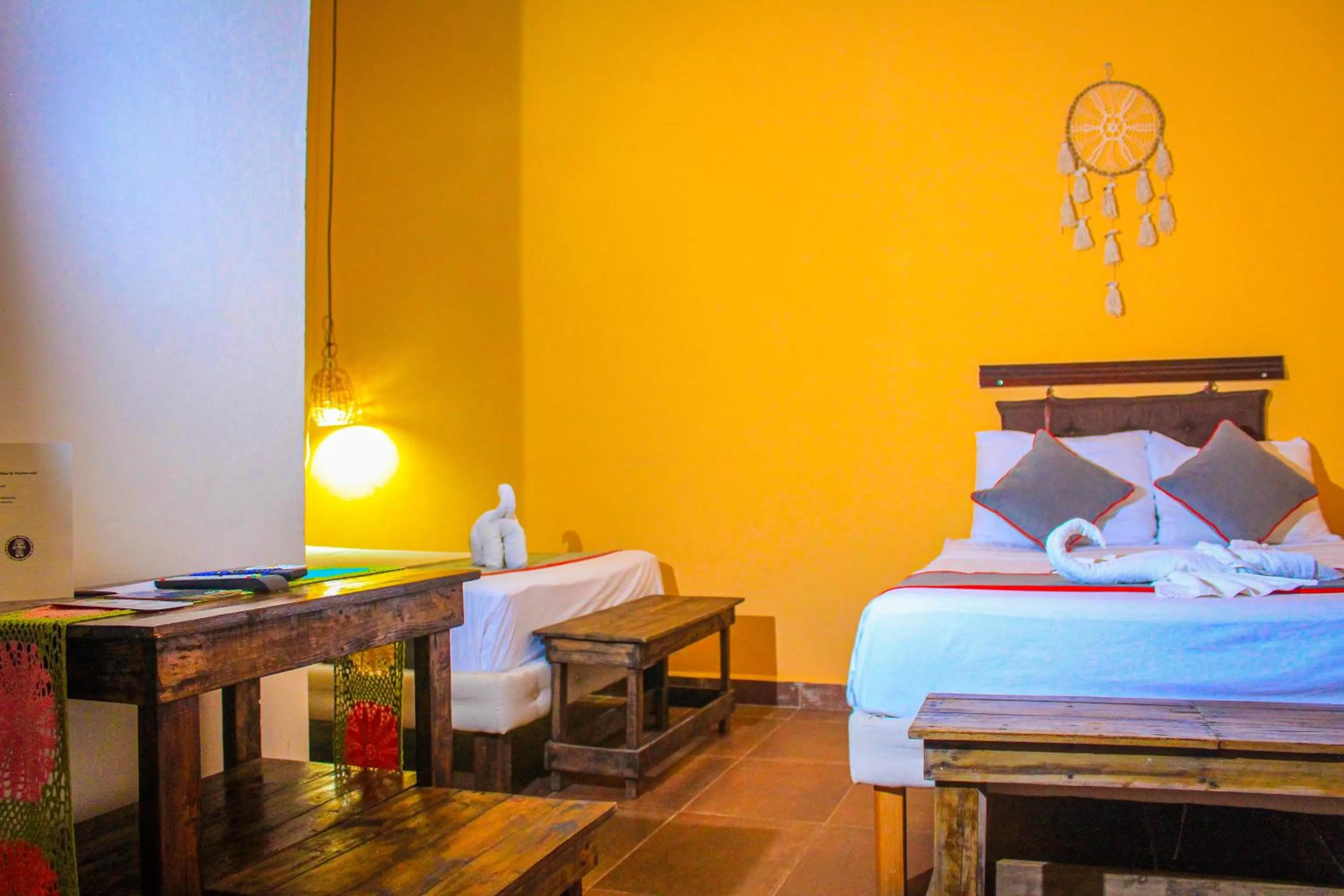 Bed in Casa Aluxes Hotel