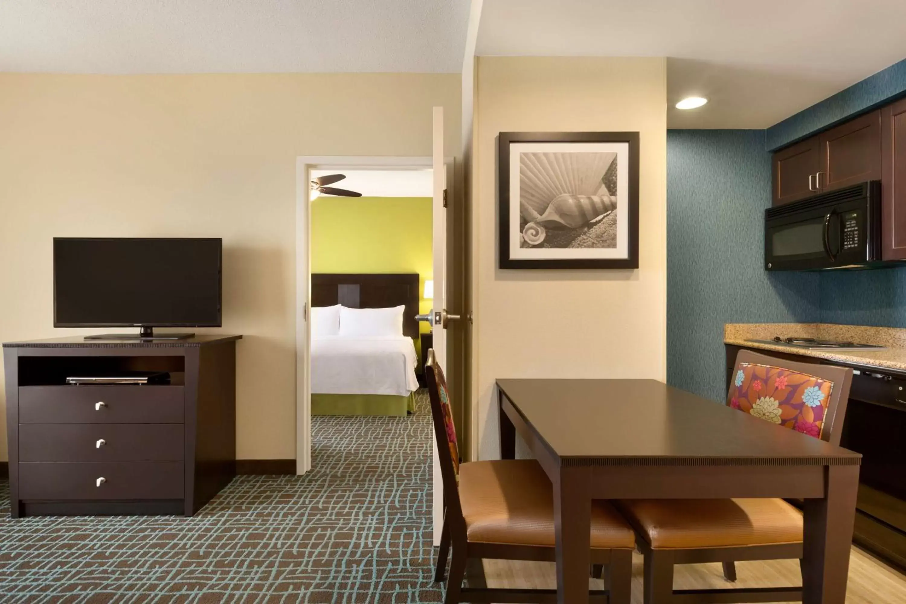 Bedroom, TV/Entertainment Center in Homewood Suites Fort Myers Airport - FGCU
