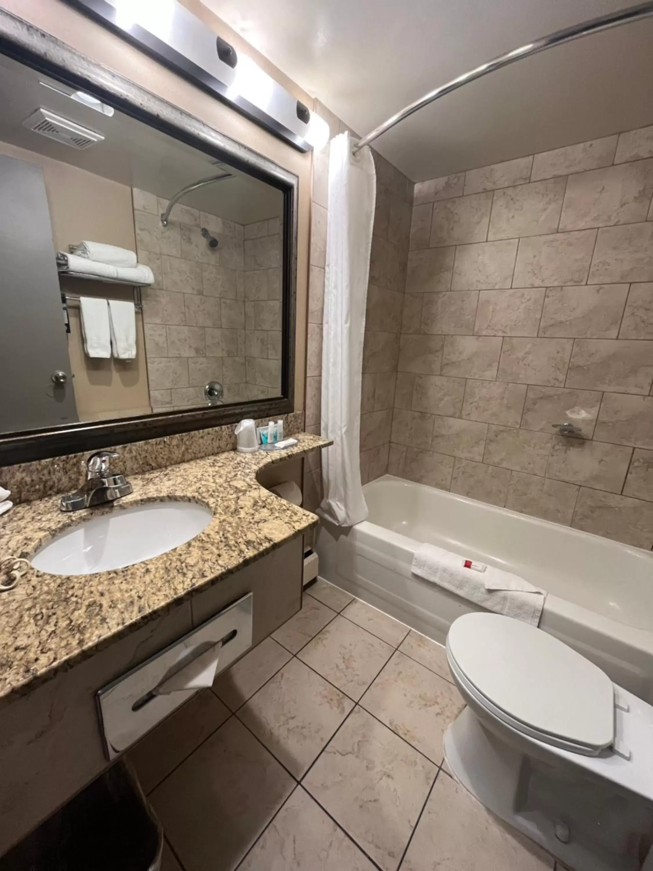 Bathroom in Super 8 by Wyndham Macleod Trail Calgary