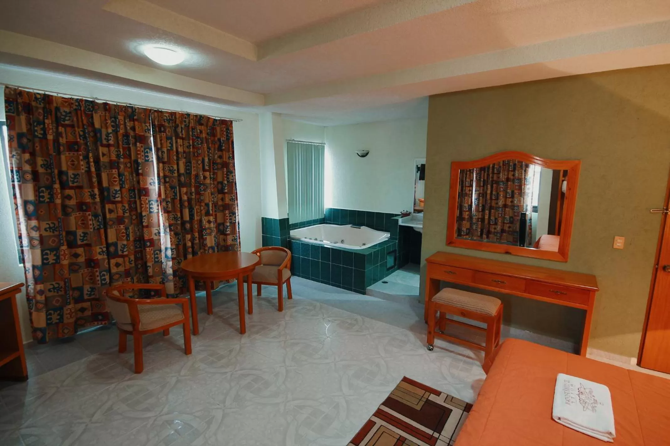 Bed in HOTEL EL CONQUISTADOR MONARCA.