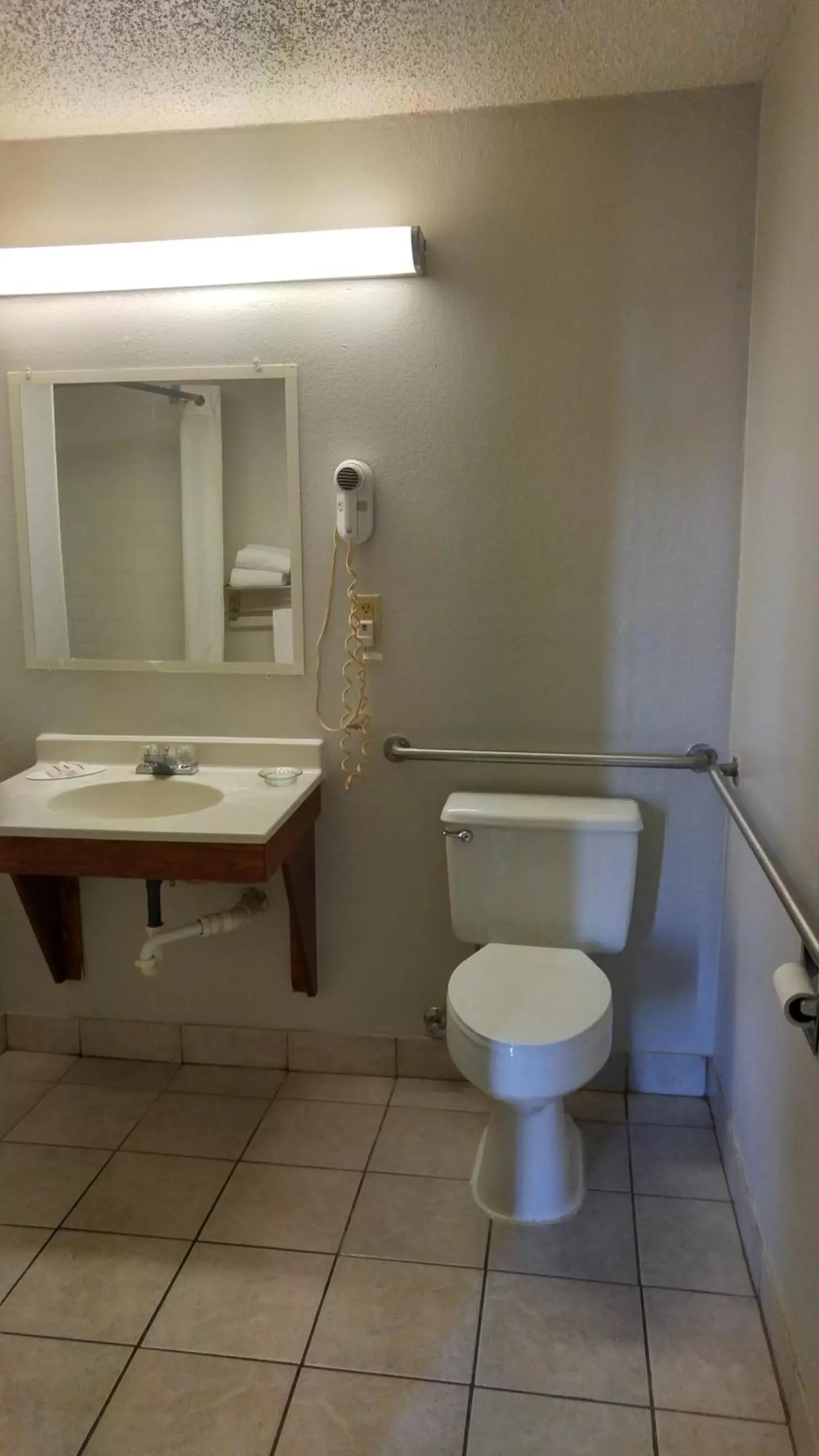 Bathroom in Super 8 by Wyndham Waynesboro