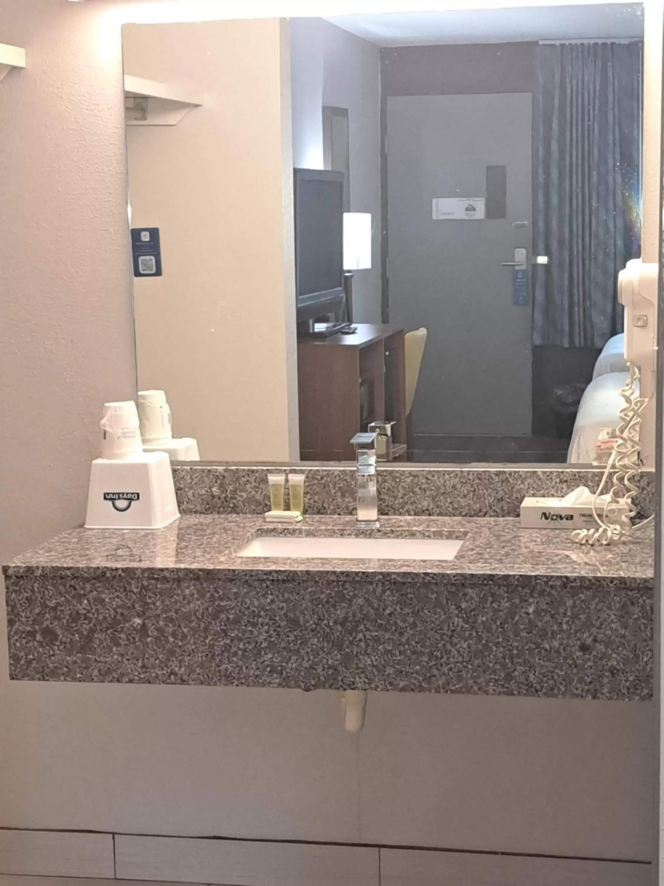 Bathroom in Days Inn & Suites by Wyndham Rocky Mount Golden East