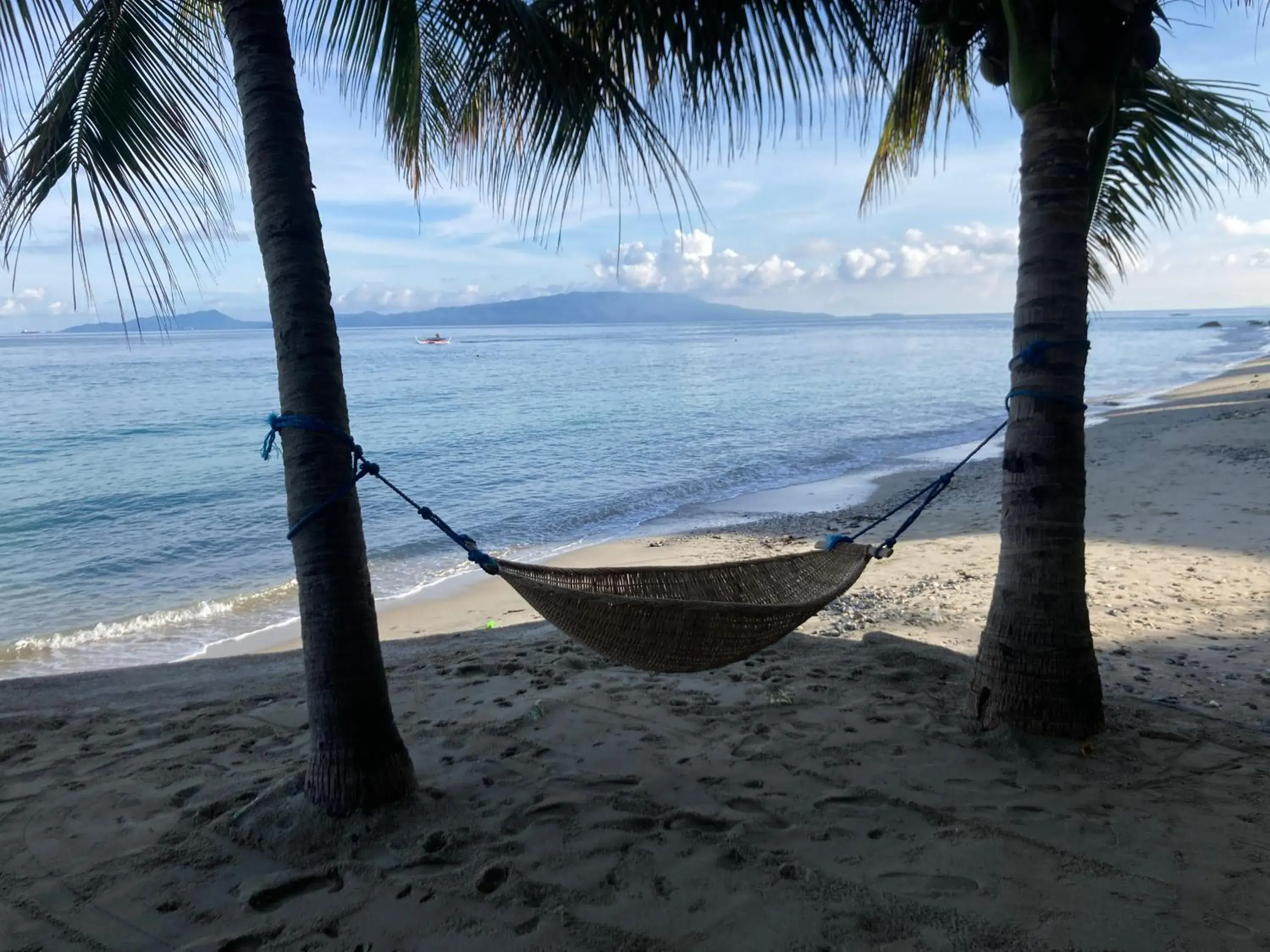 Beach in Sunset At Aninuan Beach Resort