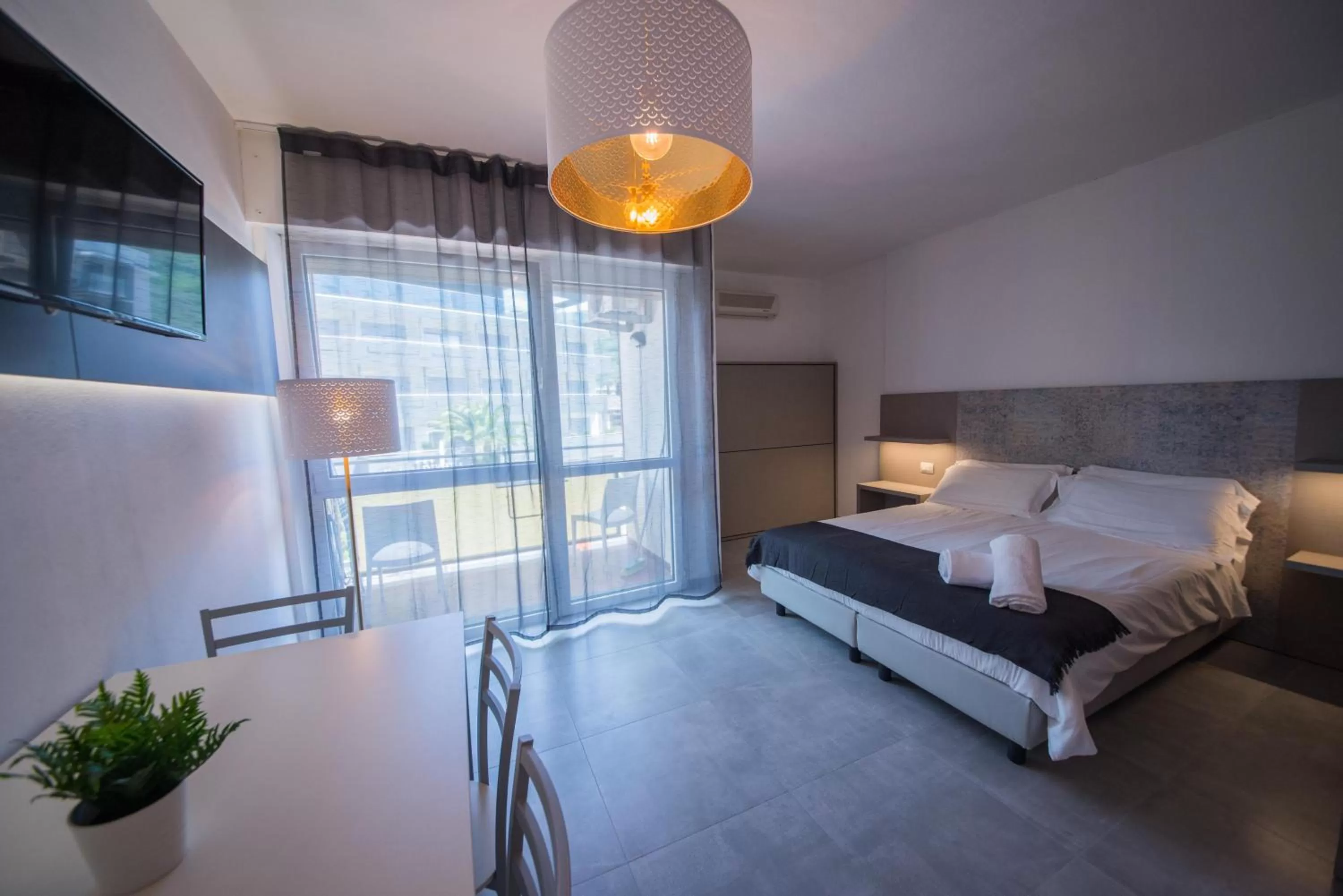 Photo of the whole room, Bed in Residence Cristine