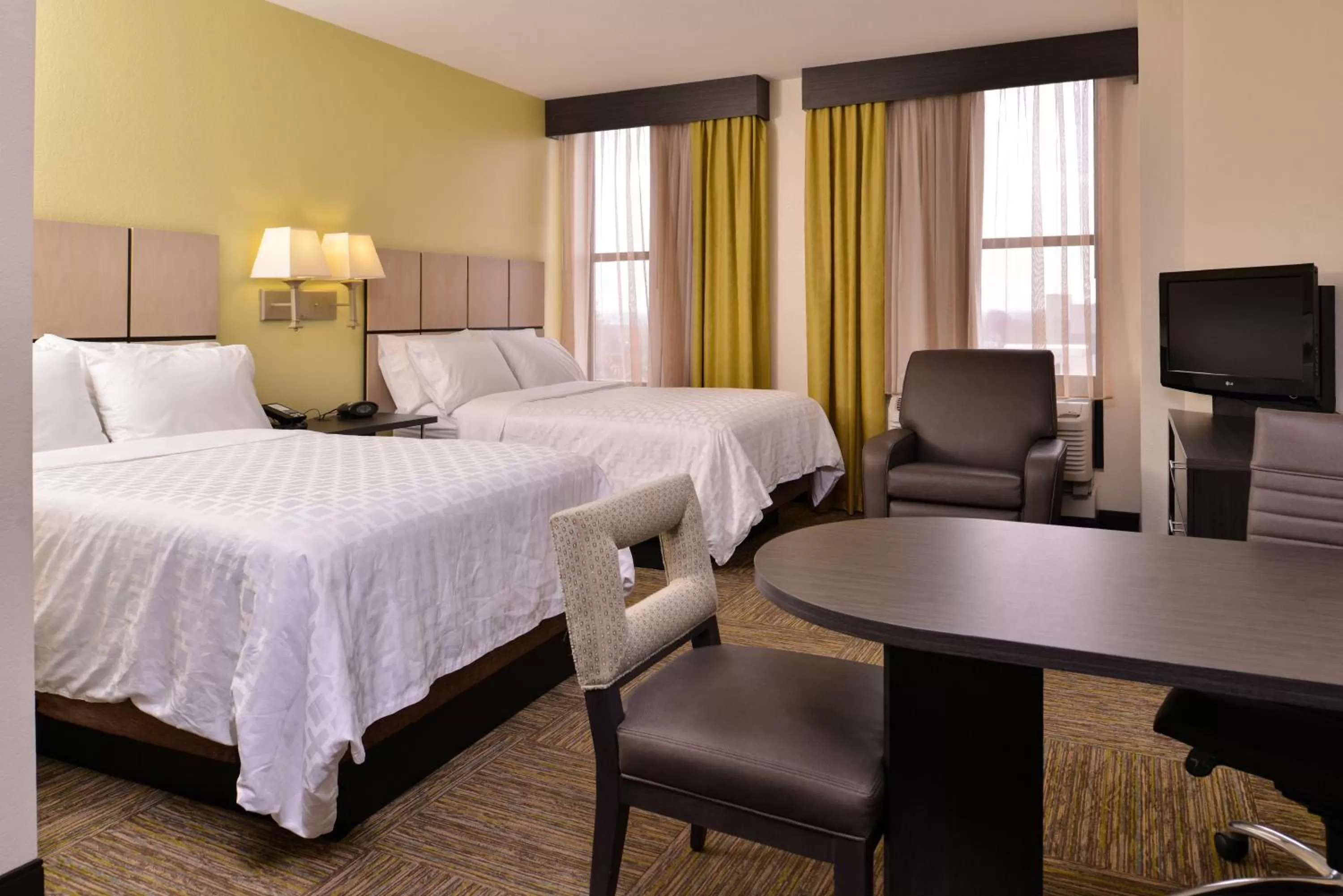 Photo of the whole room, Bed in Candlewood Suites Terre Haute by IHG