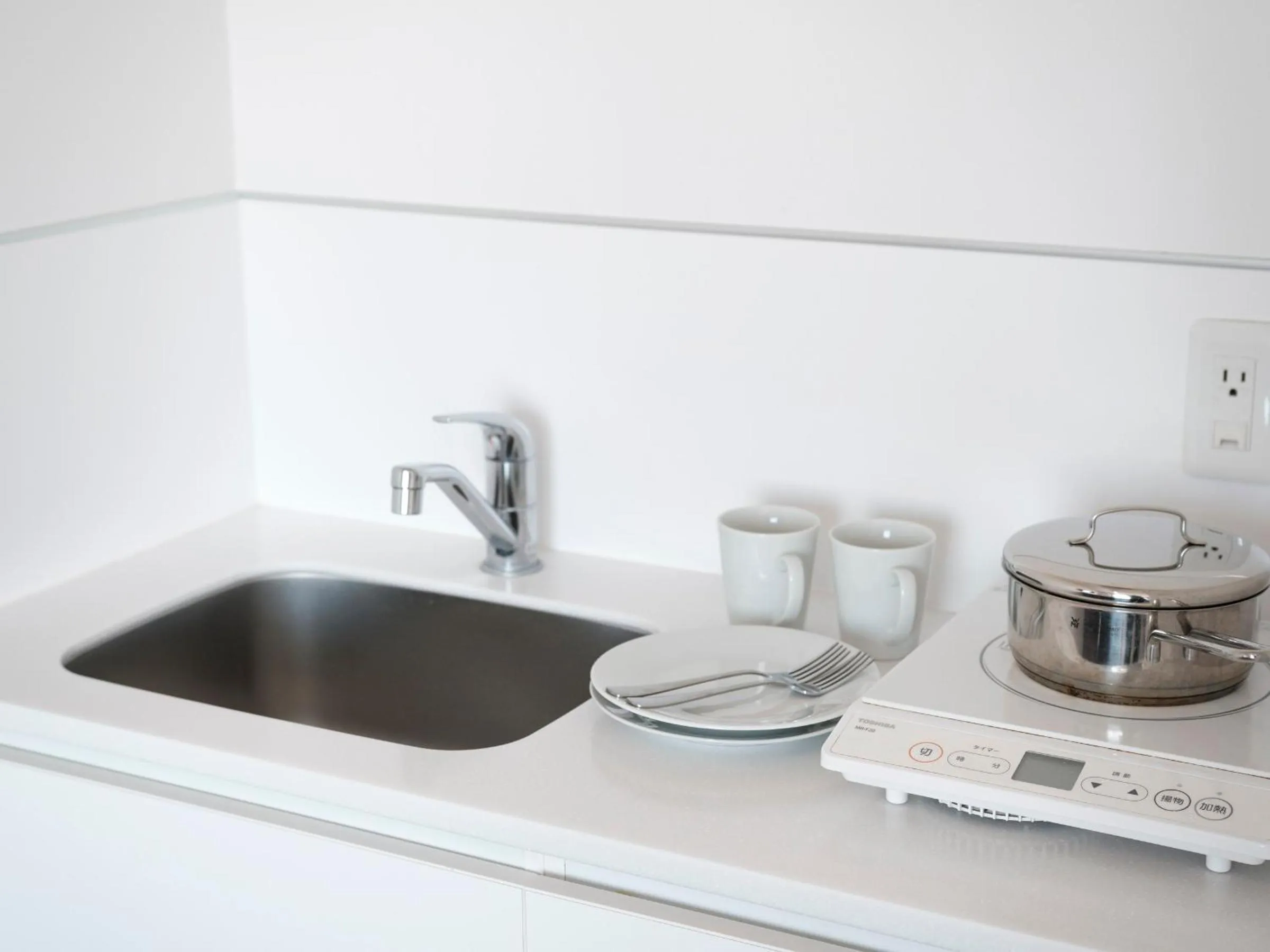 Kitchen or kitchenette in Tokyu Stay Shinjuku