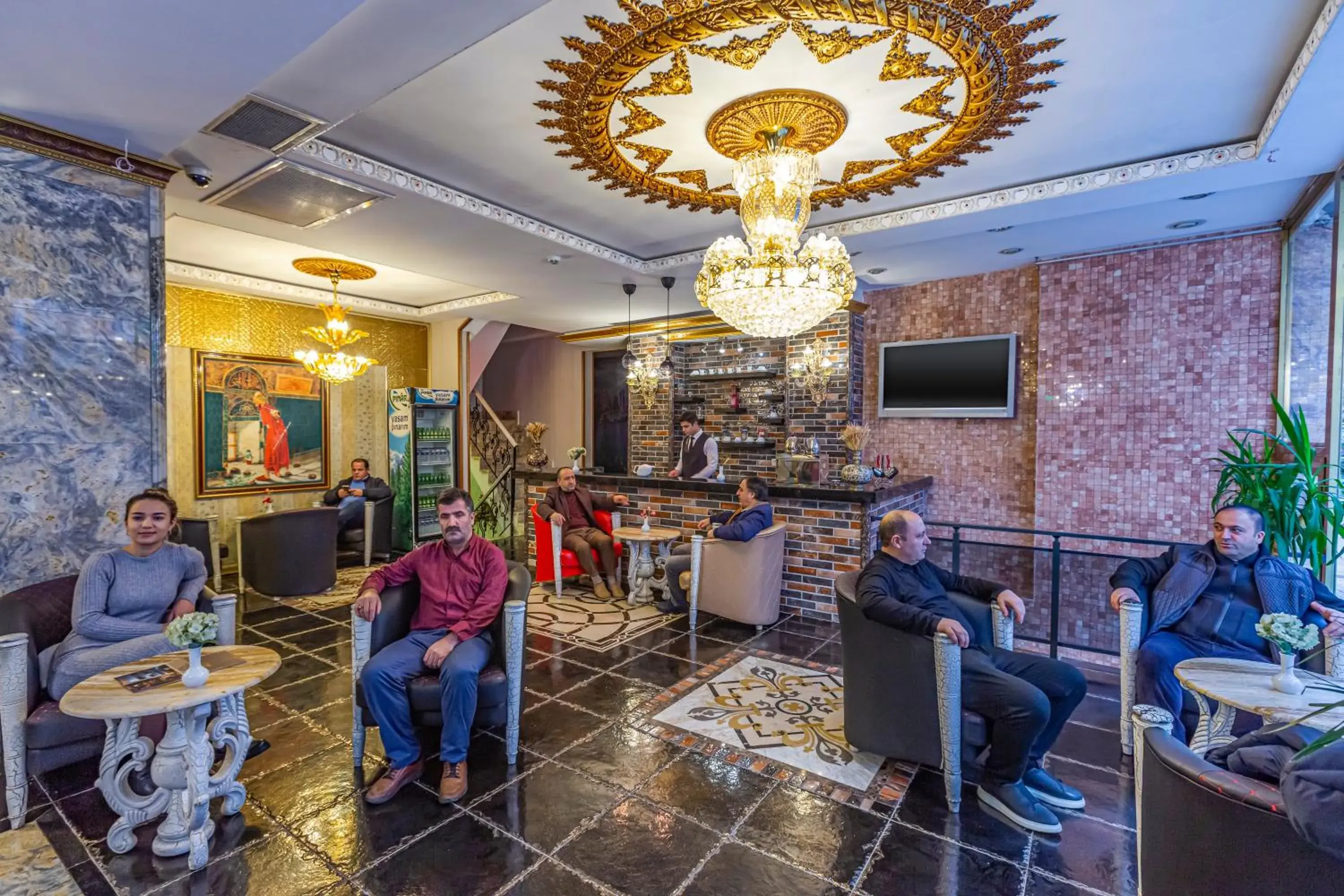 Communal lounge/ TV room in Laleli Blue Marmaray Hotel