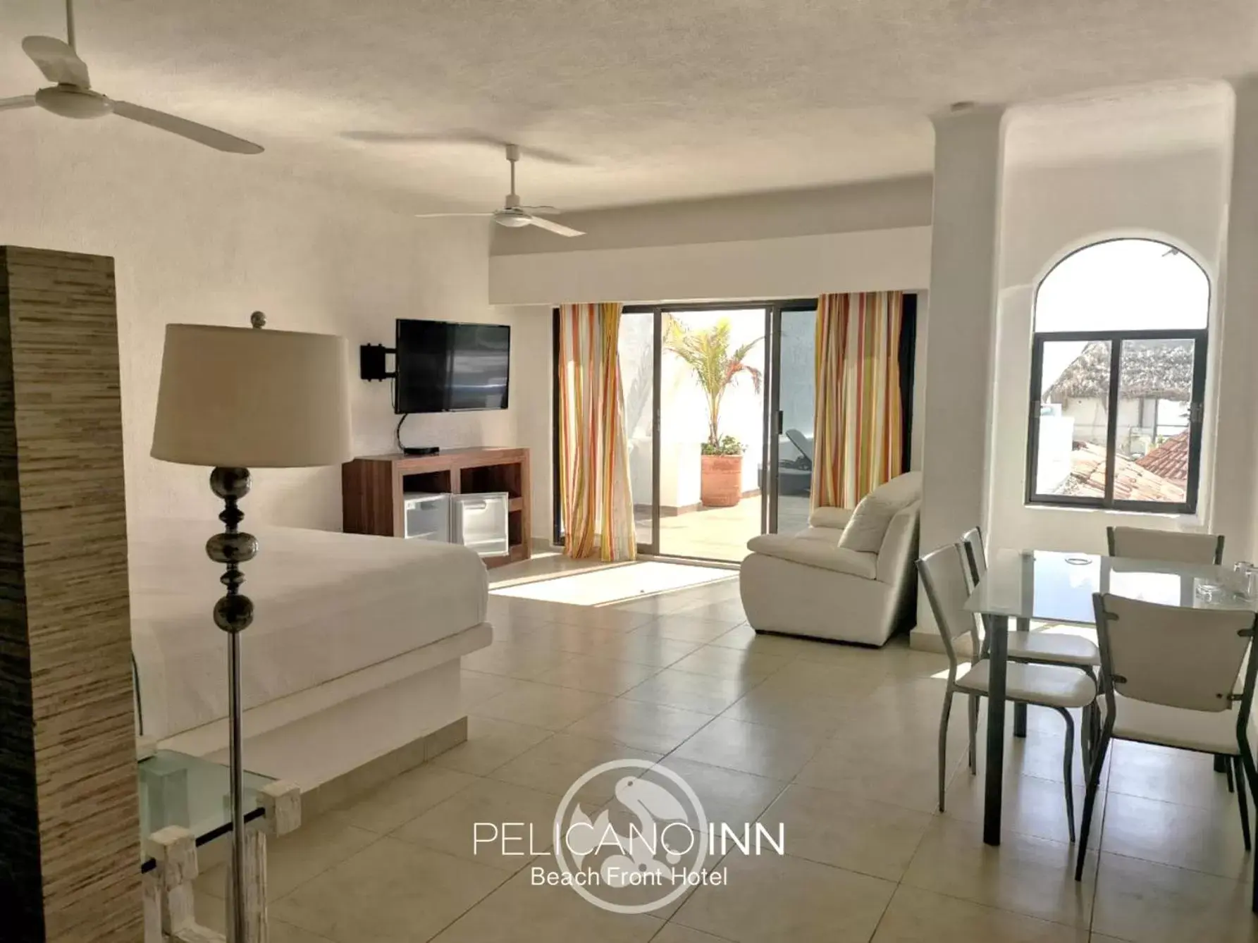 Bed in Pelicano Inn Playa del Carmen - Beachfront Hotel