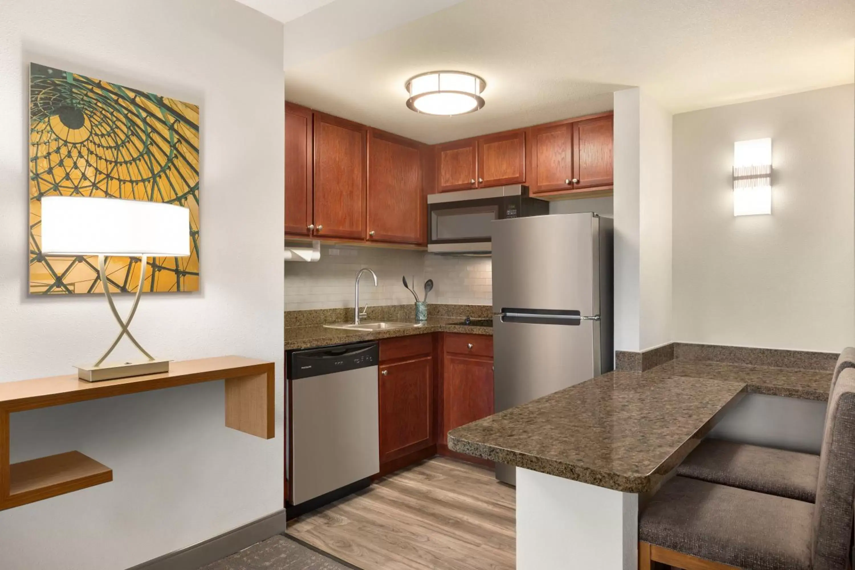 Photo of the whole room, Kitchen/Kitchenette in Staybridge Suites Tampa East- Brandon, an IHG Hotel