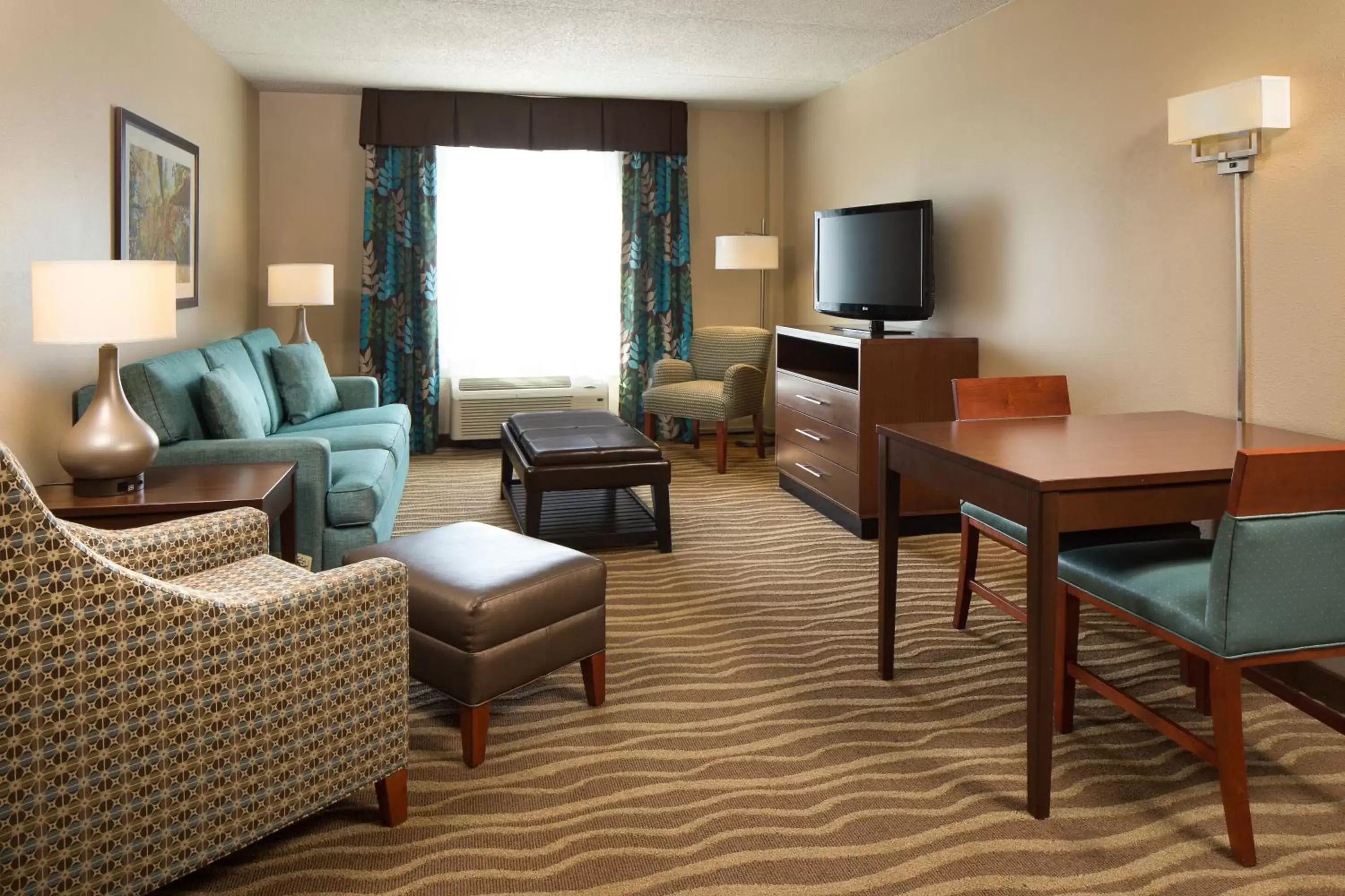 Photo of the whole room, Seating Area in Holiday Inn Hotel & Suites Overland Park-West, an IHG Hotel