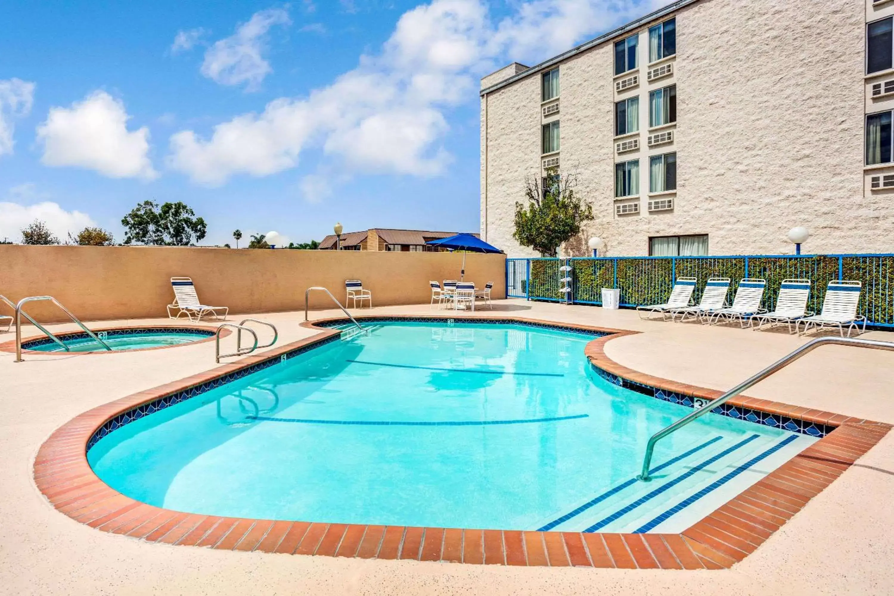 On site, Swimming Pool in Days Inn & Suites by Wyndham Fullerton