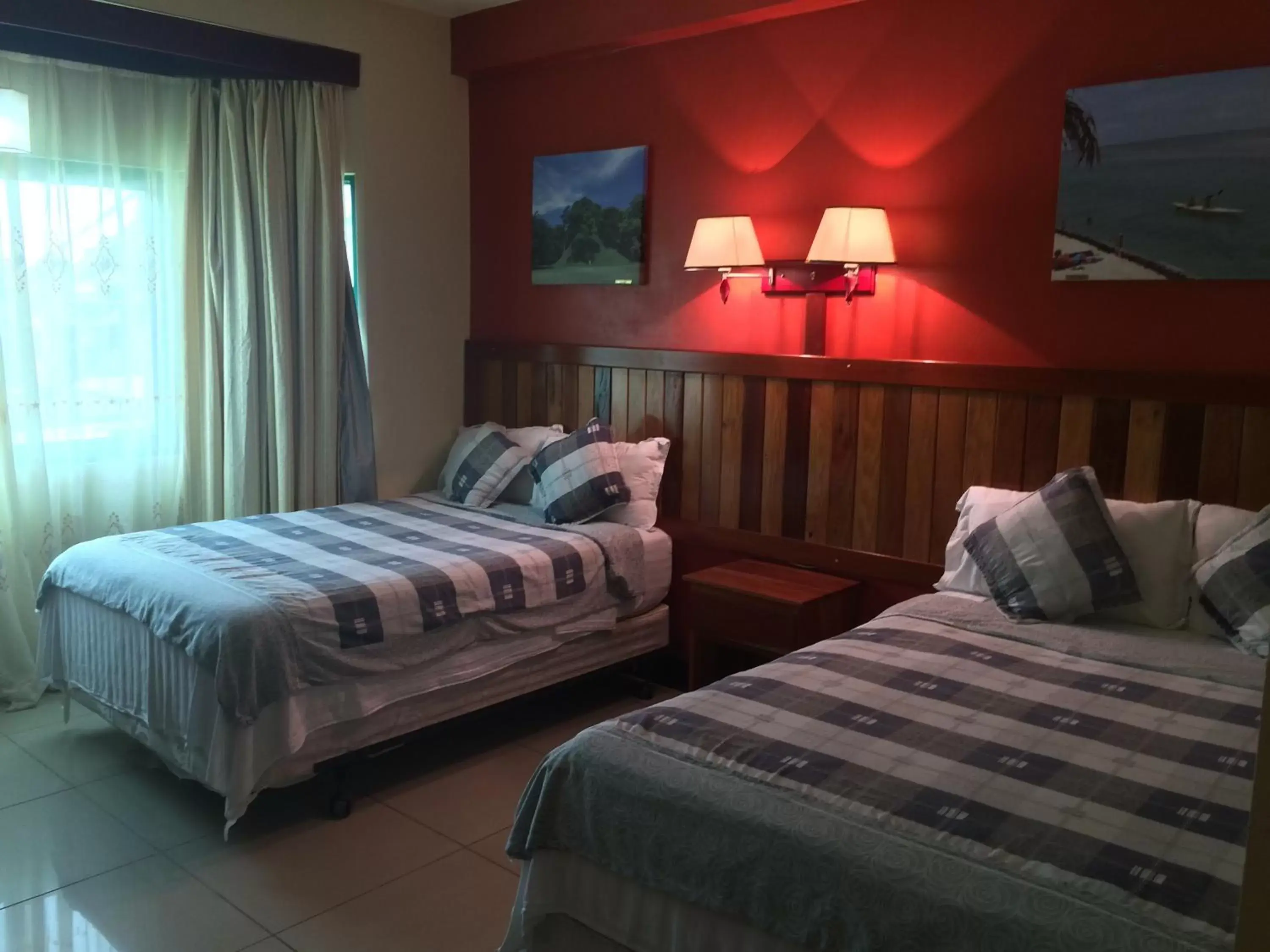 Bedroom, Bed in Caye Caulker Plaza Hotel
