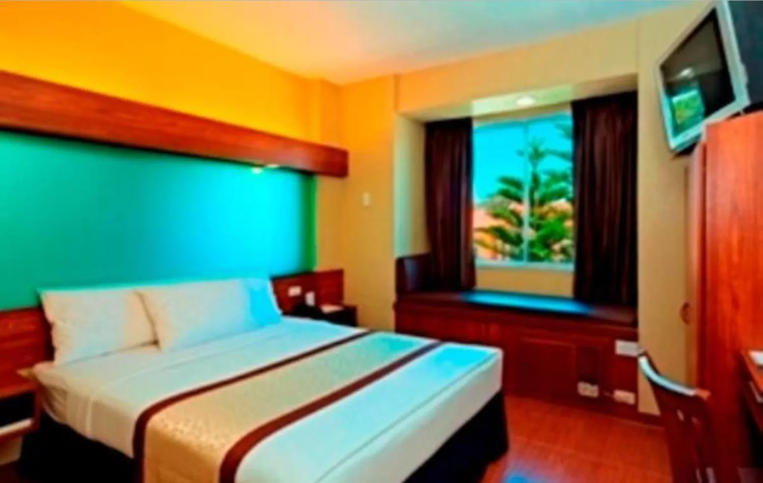 Bed in Microtel by Wyndham Baguio