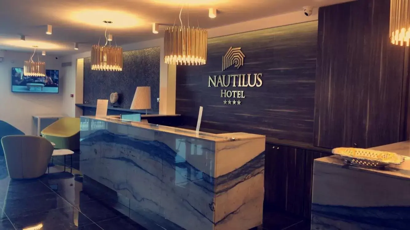 Property logo or sign in Nautilus Hotel